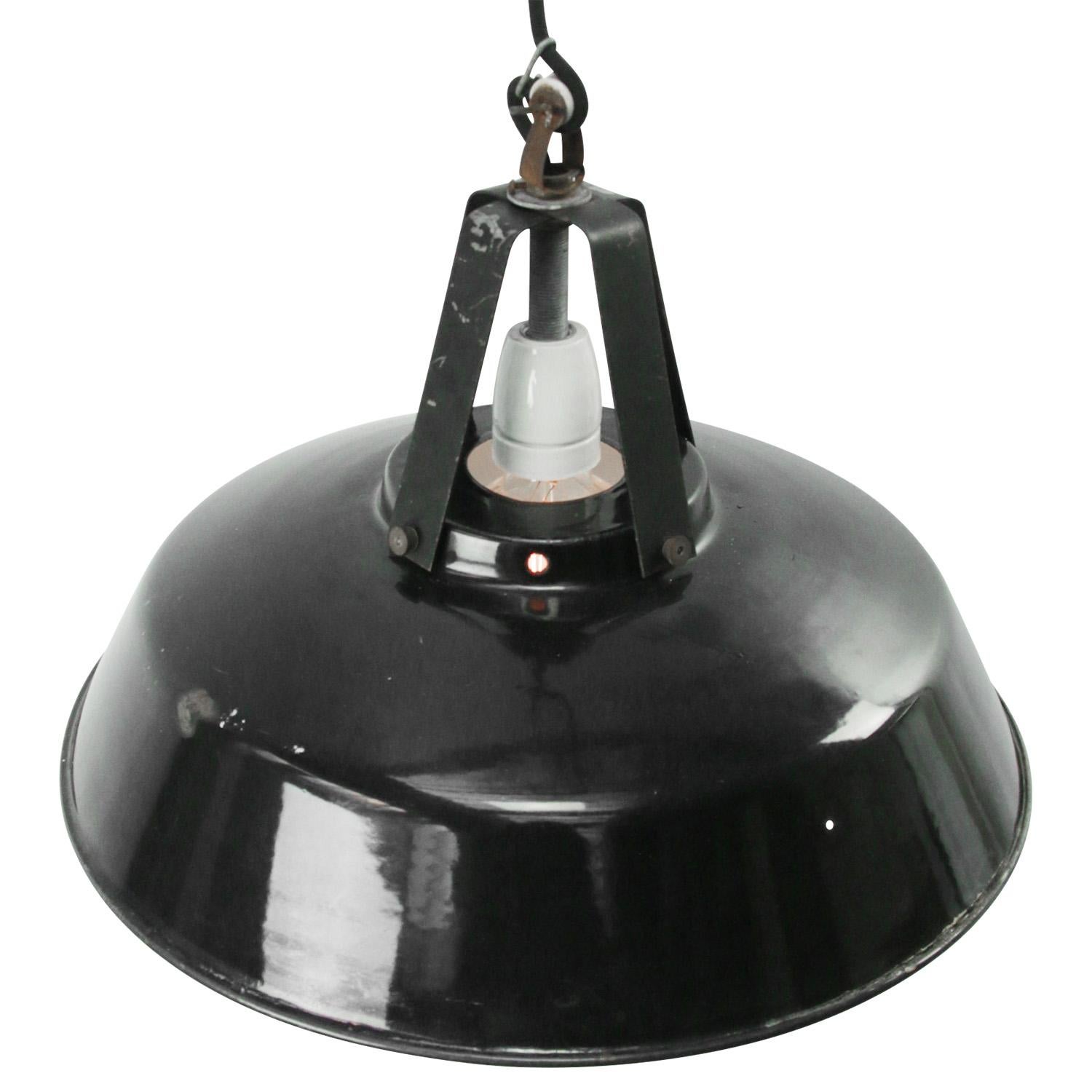 French factory light.
Black iron top with enamel shade.
White inside.

Weight: 1.60 kg / 3.5 lb

Priced per individual item. All lamps have been made suitable by international standards for incandescent light bulbs, energy-efficient and LED