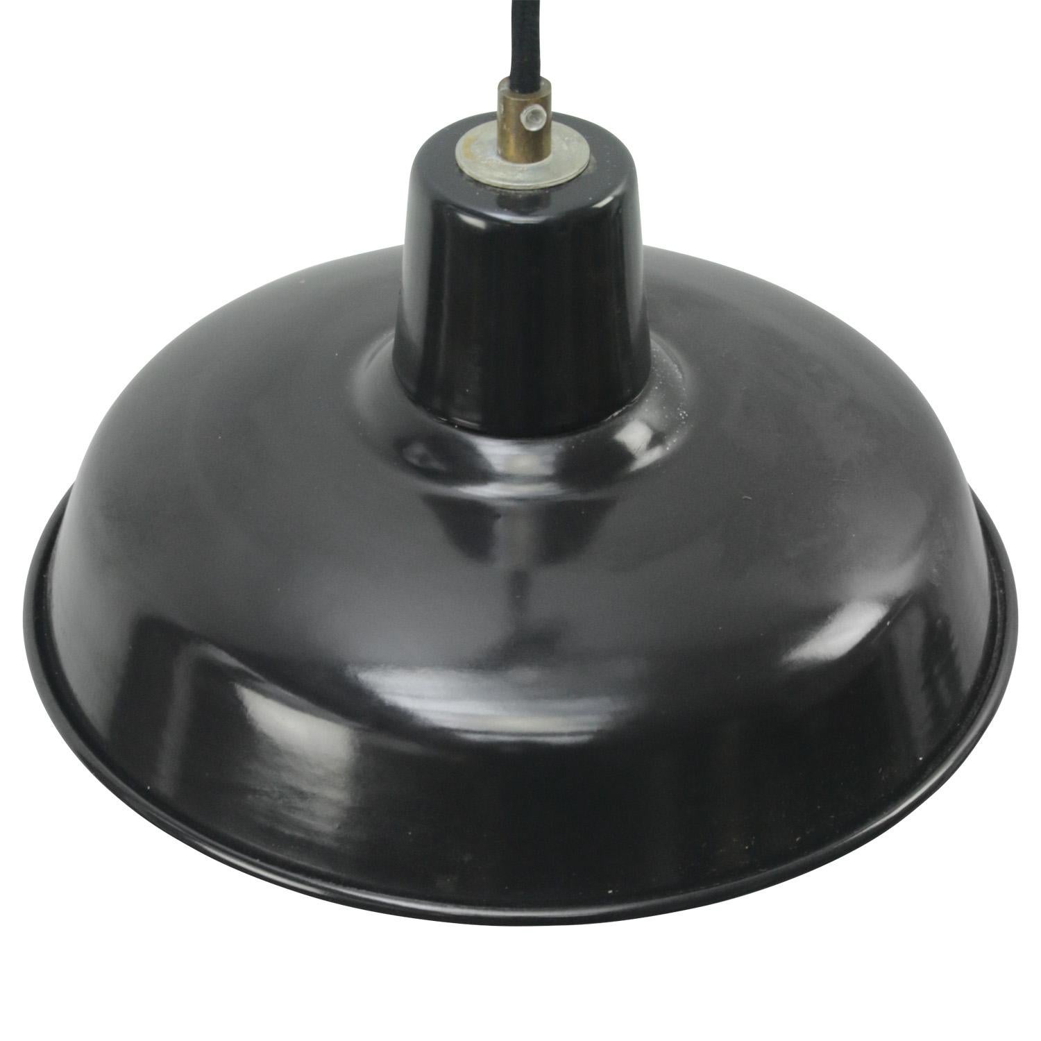 French black enamel Industrial pendant lamp.
Used in warehouses and factories in France.

Weight: 1.00 kg / 2.2 lb

Priced per individual item. All lamps have been made suitable by international standards for incandescent light bulbs,