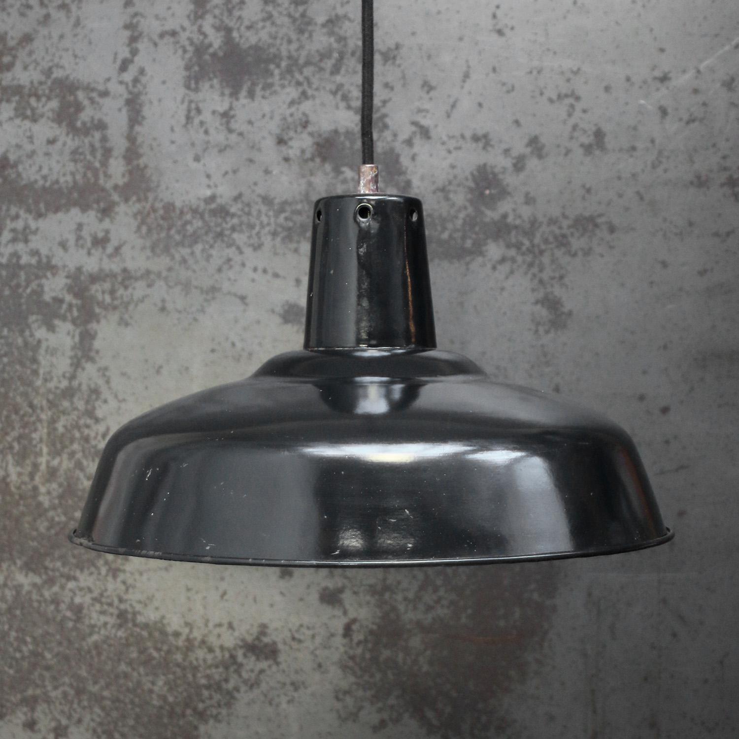 French factory pendant light
Black enamel, white interior

Weight: 1.20 kg / 2.6 lb

Priced per individual item. All lamps have been made suitable by international standards for incandescent light bulbs, energy-efficient and LED bulbs. E26/E27 bulb