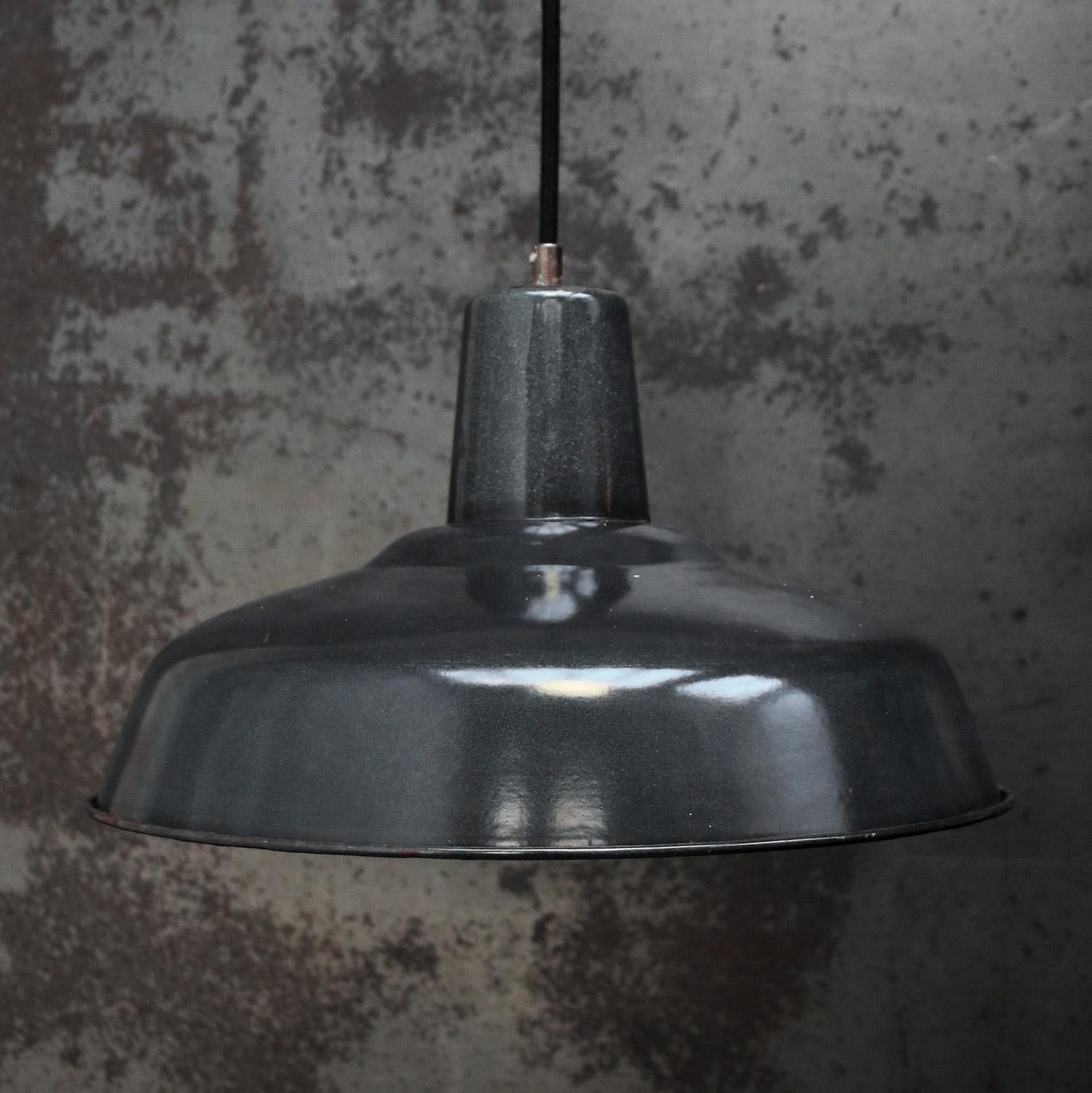 French factory pendant light
Black enamel, white interior

Weight: 1.20 kg / 2.6 lb

Priced per individual item. All lamps have been made suitable by international standards for incandescent light bulbs, energy-efficient and LED bulbs. E26/E27 bulb