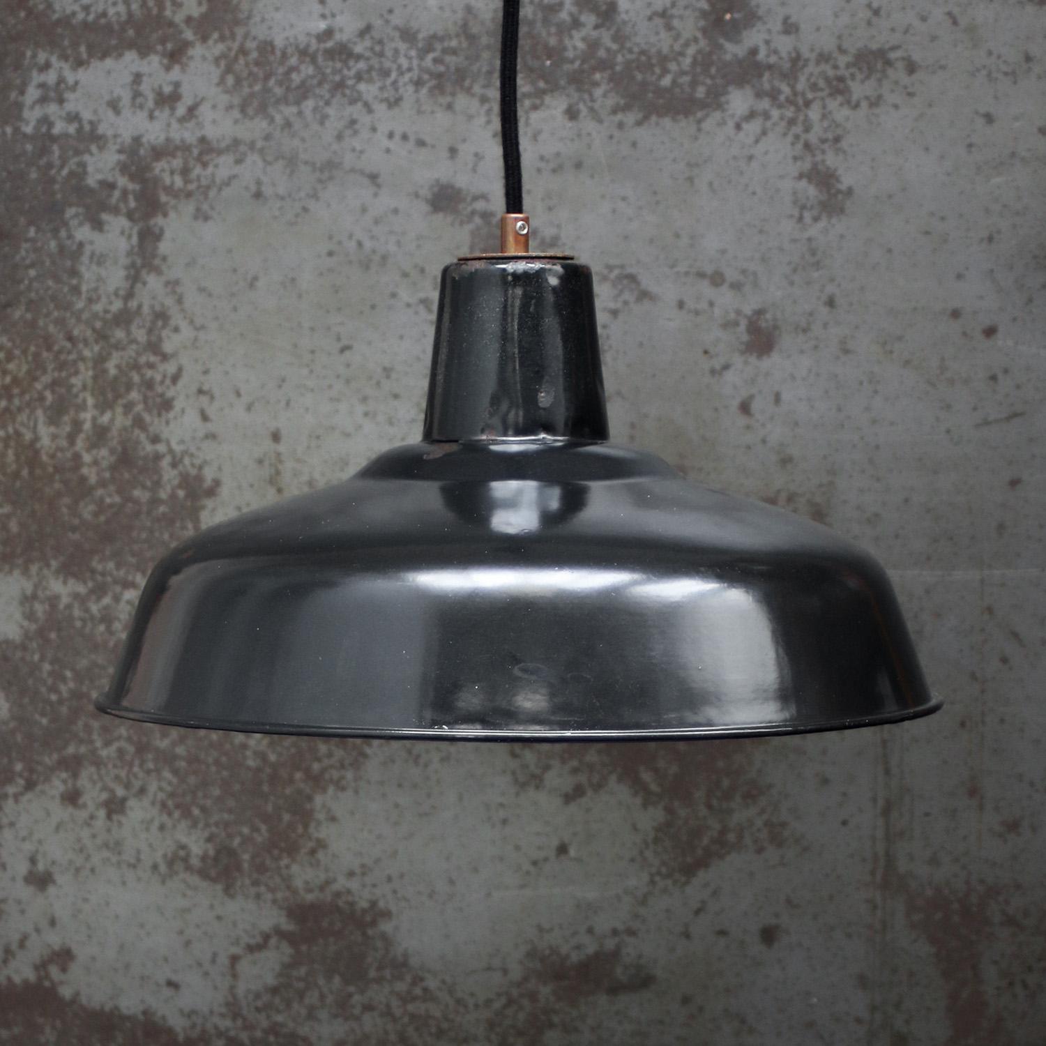 French factory pendant light
Black enamel, white interior

Weight: 1.20 kg / 2.6 lb

Priced per individual item. All lamps have been made suitable by international standards for incandescent light bulbs, energy-efficient and LED bulbs. E26/E27 bulb