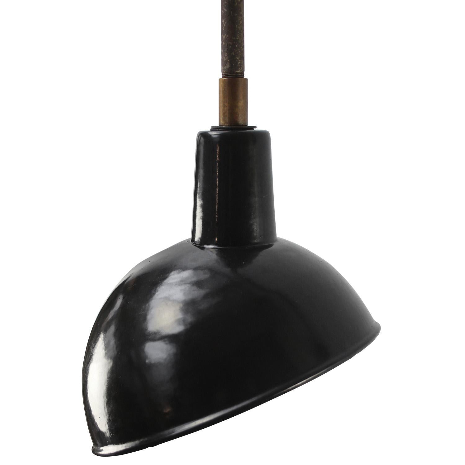 Black enamel industrial wall light with white interior.

Diameter cast iron wall mount: 10.5 cm / 4” cm, 2 holes to secure.

Weight: 2.50 kg / 5.5 lb

Priced per individual item. All lamps have been made suitable by international standards for