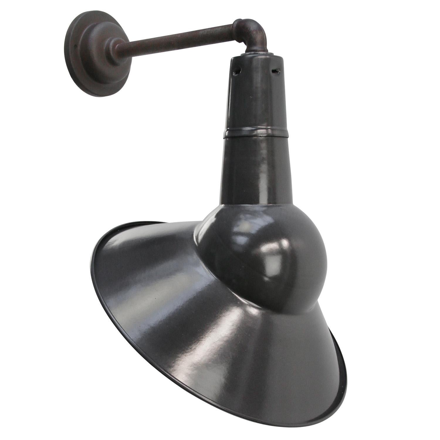 French factory wall light
black enamel, white interior

diameter cast iron wall piece: 10.5 cm / 4”.
2 holes to secure

Weight: 1.80 kg / 4 lb

Priced per individual item. All lamps have been made suitable by international standards for incandescent