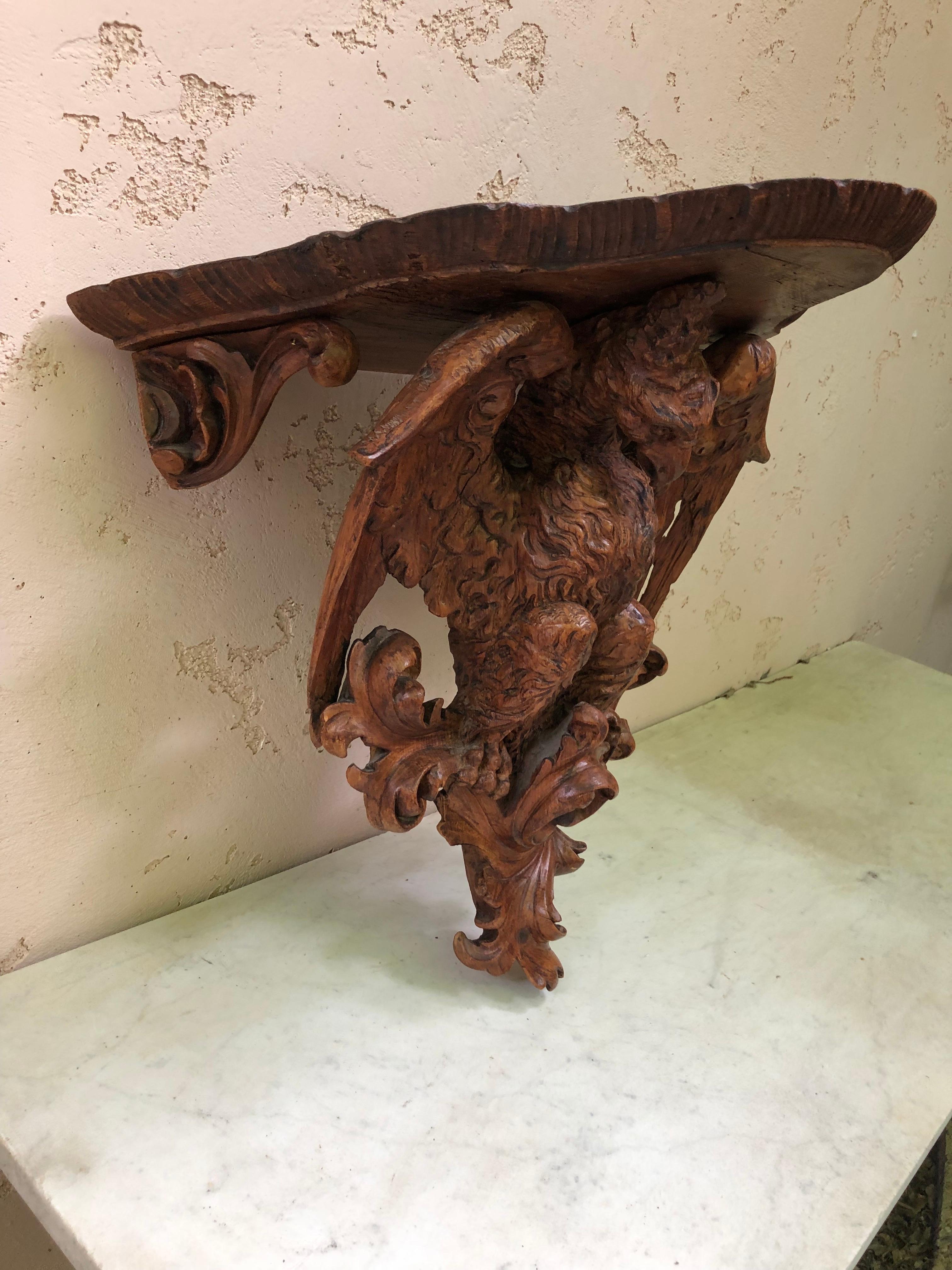 Large French carved wood Black Forest Eagle Wall Bracket Circa 1900.
Acanthus leaves.