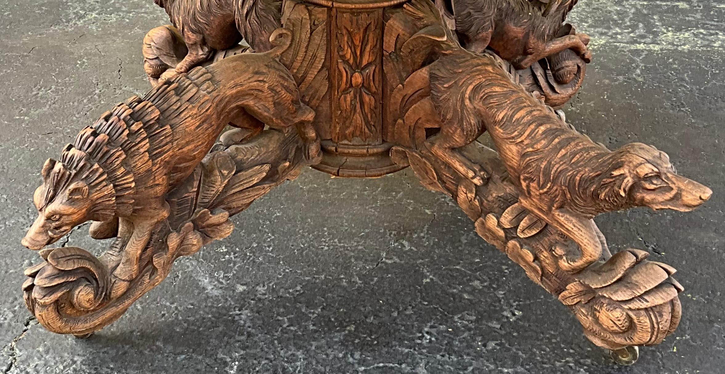 French Black Forest Style Carved Oak Center / Dining Table, Dog, Deer, Boar In Good Condition In Kennesaw, GA