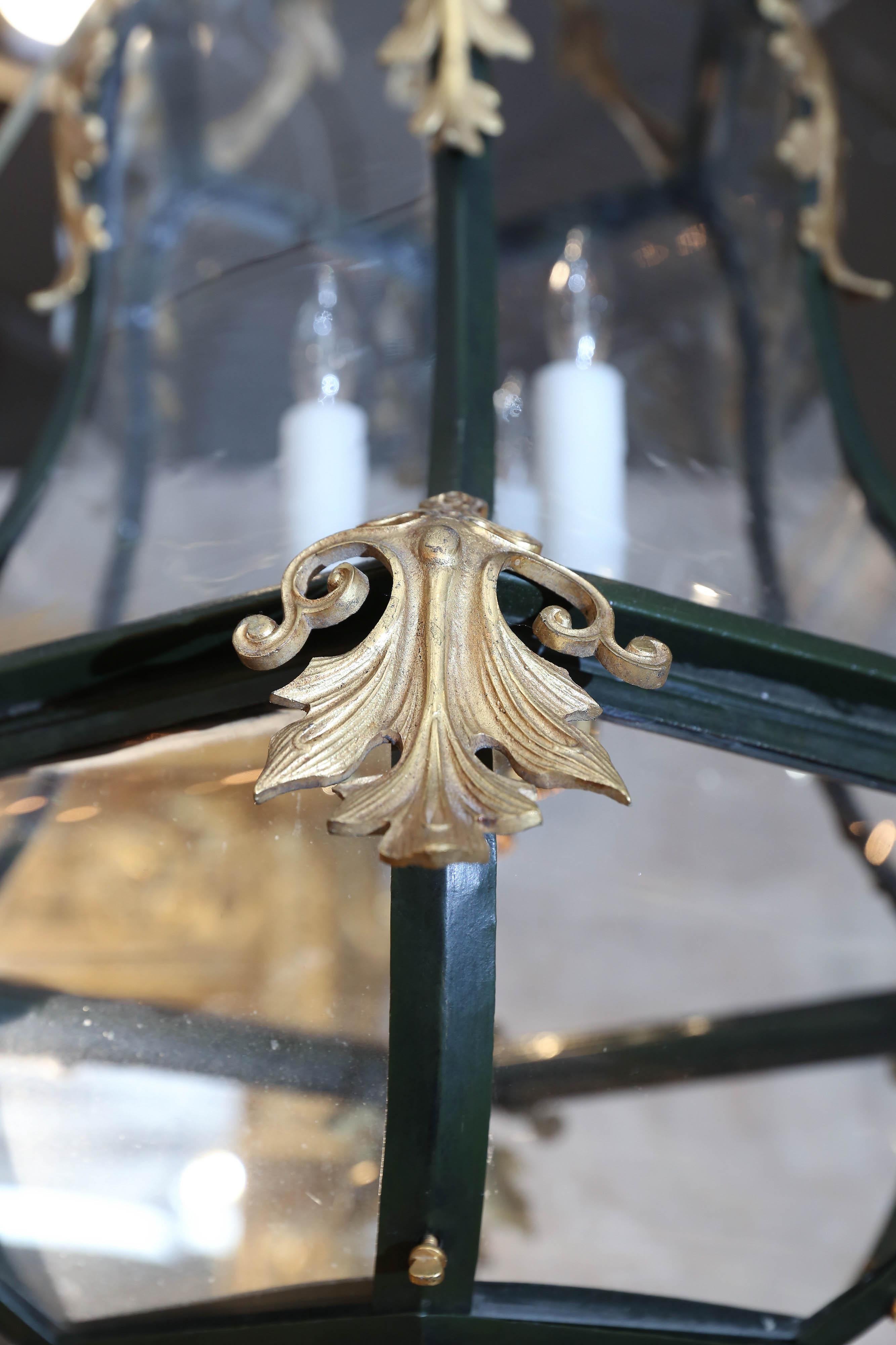French Black Iron and Gilt Bronze Lantern Chandelier with Glass Inserts In Good Condition In Houston, TX