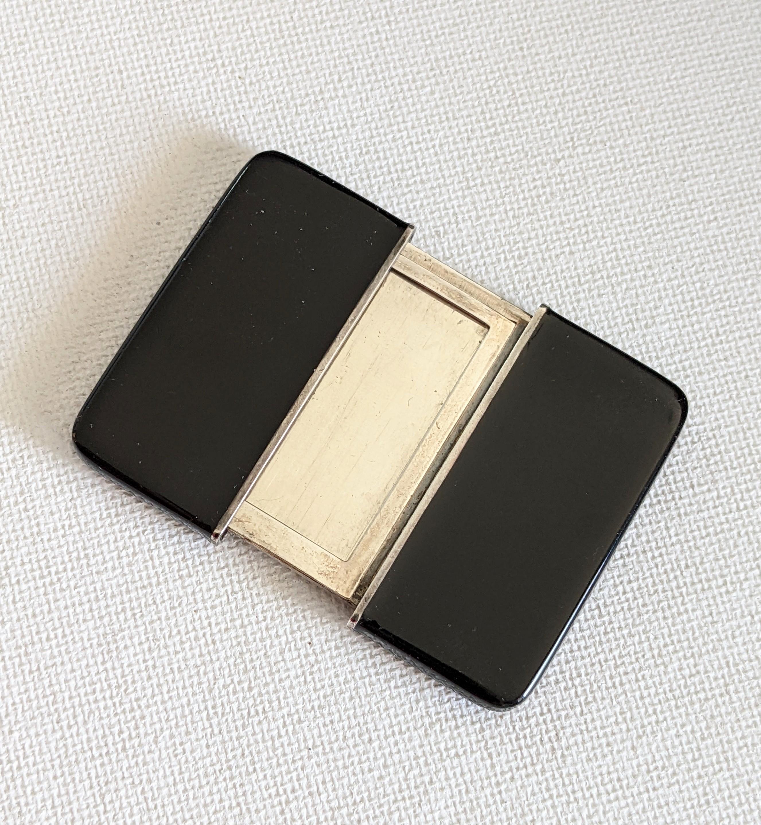 Elegant French Black Lacquer Travel Photo Frame to keep close ones at hand. Cover slides over on each side to reveal photo which can be propped up on a table as well. Marked LaFoto, Made in France. 1930's Silverplate. 