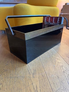Porte-revues en lucite noire et bronze attribué à Dior