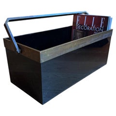 Porte-revues en lucite noire et bronze attribué à Dior
