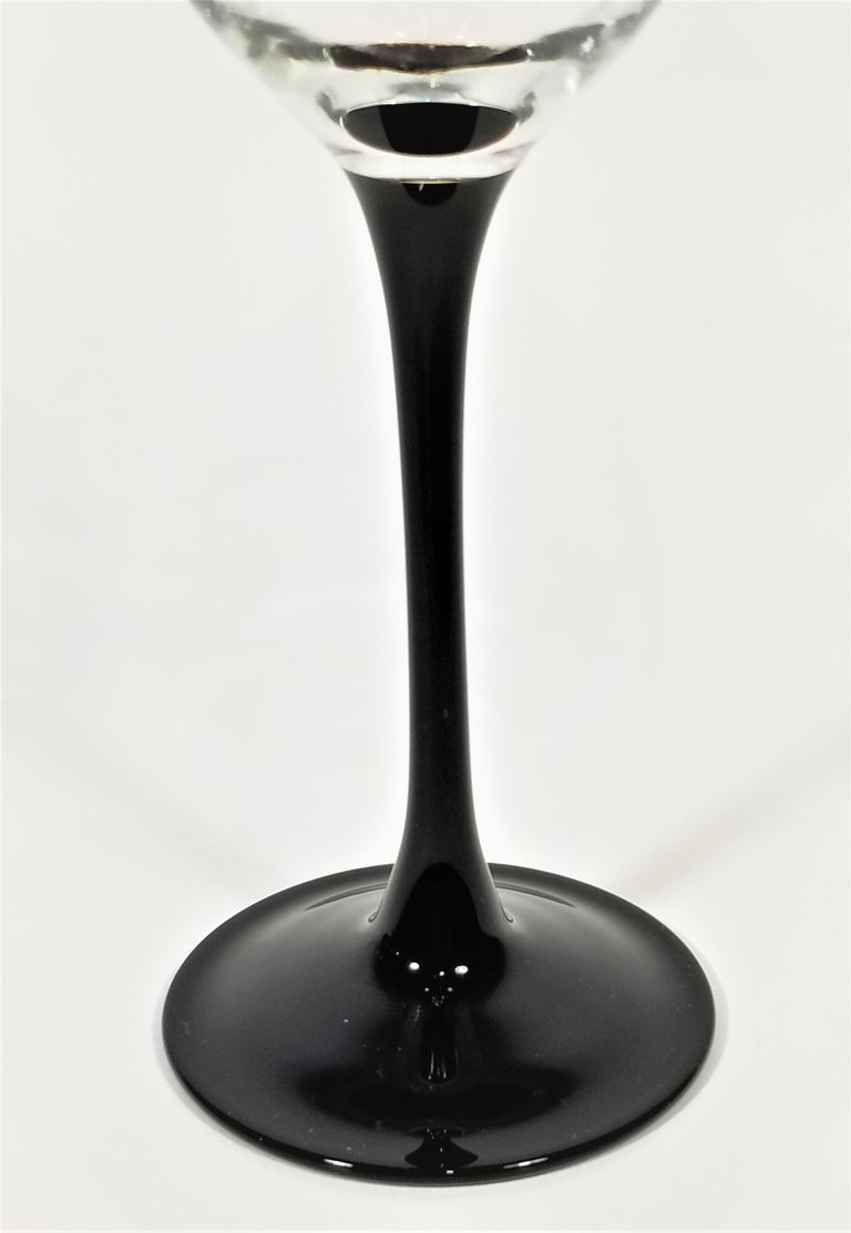 https://a.1stdibscdn.com/french-black-tulip-base-stemware-wine-glasses-made-in-france-for-sale-picture-9/f_9213/1613435569923/f_9_master.jpg?width=768