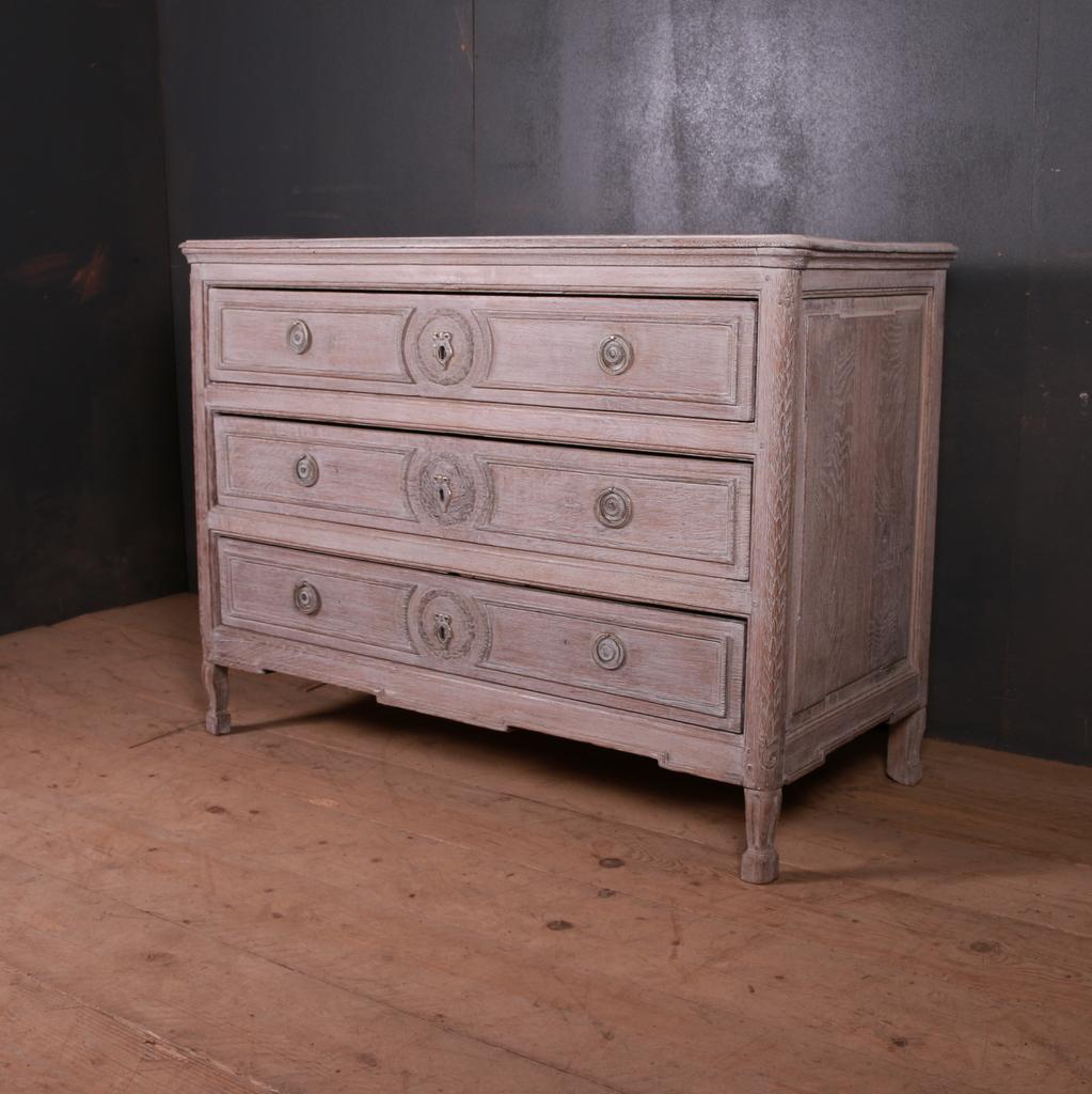 18th century bleached oak three-drawer commode, 1790.

Dimensions:
49.5 inches (126 cms) wide
22.5 inches (57 cms) deep
36.5 inches (93 cms) high.