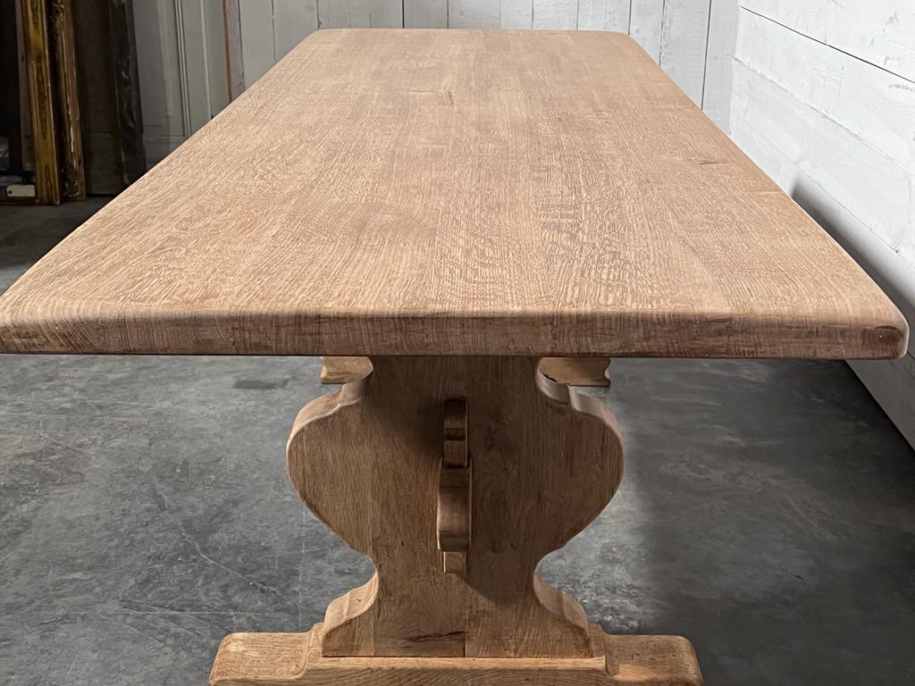 An excellently practical Farmhouse dining table having a very good end overhang at 44cm to push a chair under. Made from solid Oak in the early 1900s and of excellent quality this table will be around for generations to come. We have bleached it for
