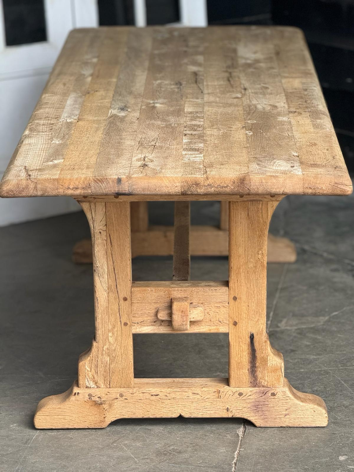 A very good quality solid Oak Farmhouse Dining Table. French in origin and dating to the early 1900s. It comes completely apart for easy access into the home. We have bleached it for a lighter look. In overall excellent original condition.
Length