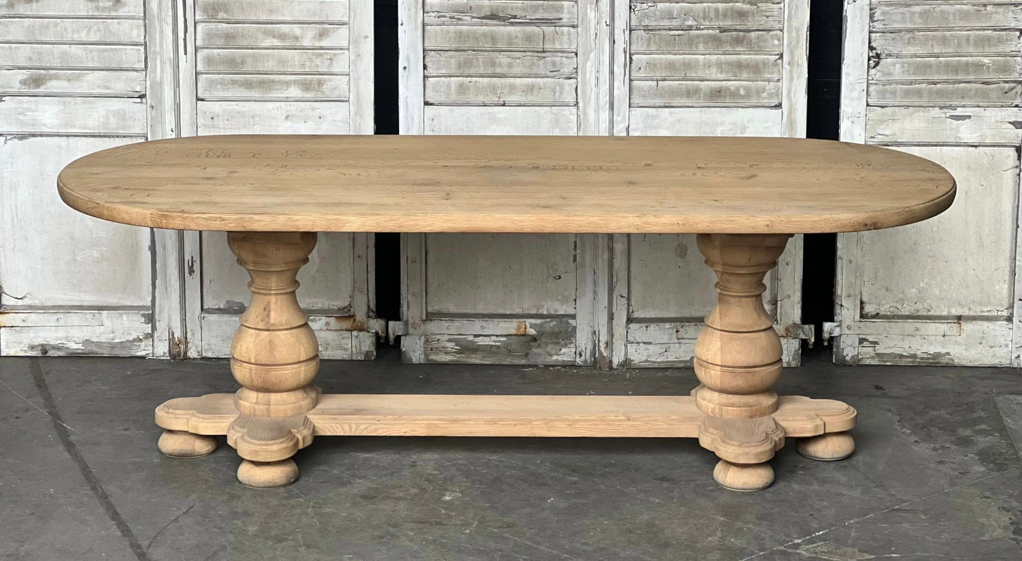 A wonderful shaped French Monastery Refectory dining table. Made from solid Oak and having a super ecclesiastical Base. An excellent quality table that will be around for generations to come. We have bleached it for a lighter look and in excellent