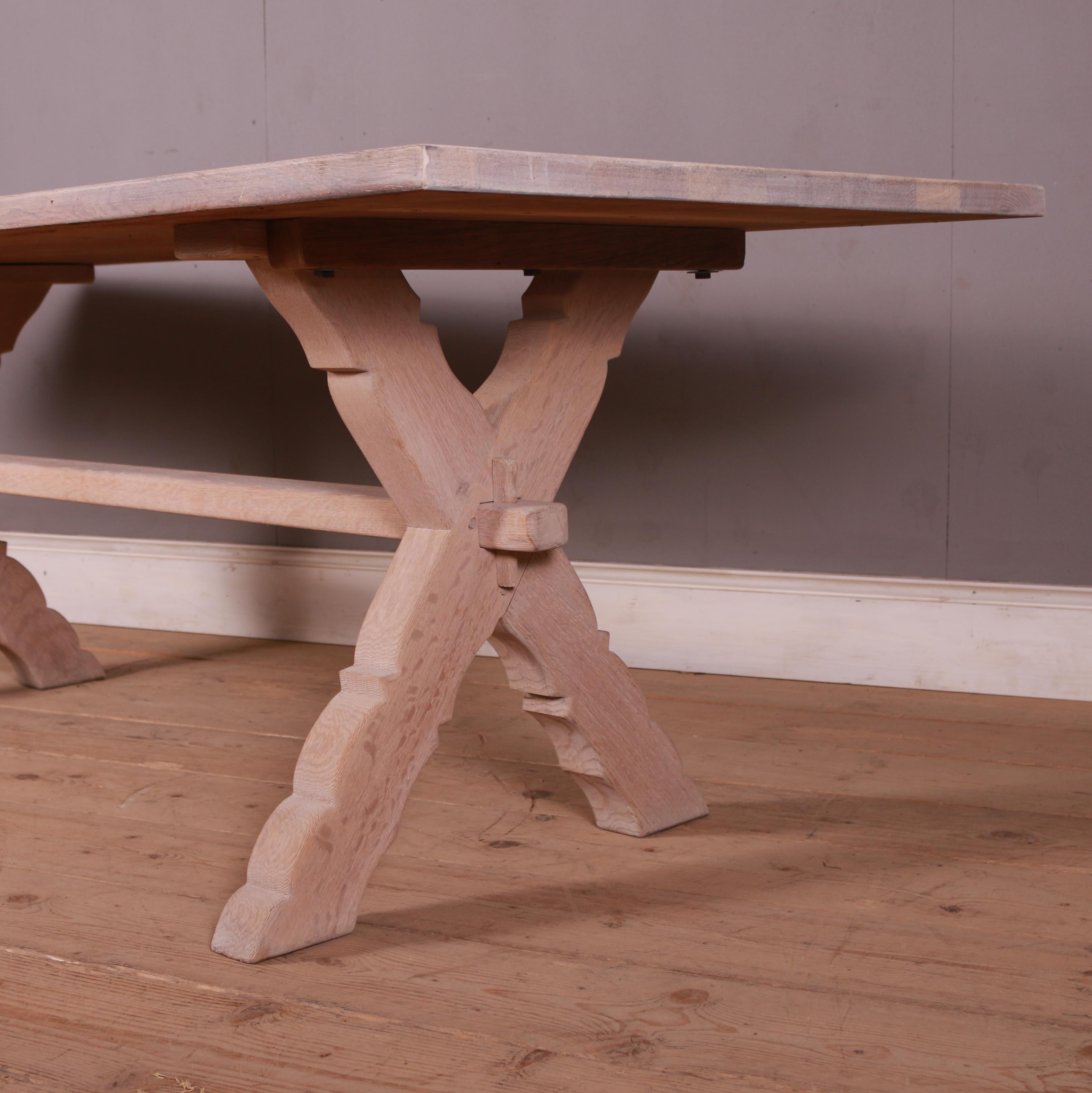 Early 20th c French bleached oak trestle table with shaped legs. 1910.

Dismantled dimensions: 210 W x 85 D x 14 H cms.

Dimensions
82.5 inches (210 cms) wide
33.5 inches (85 cms) deep
28.5 inches (72 cms) high.

 