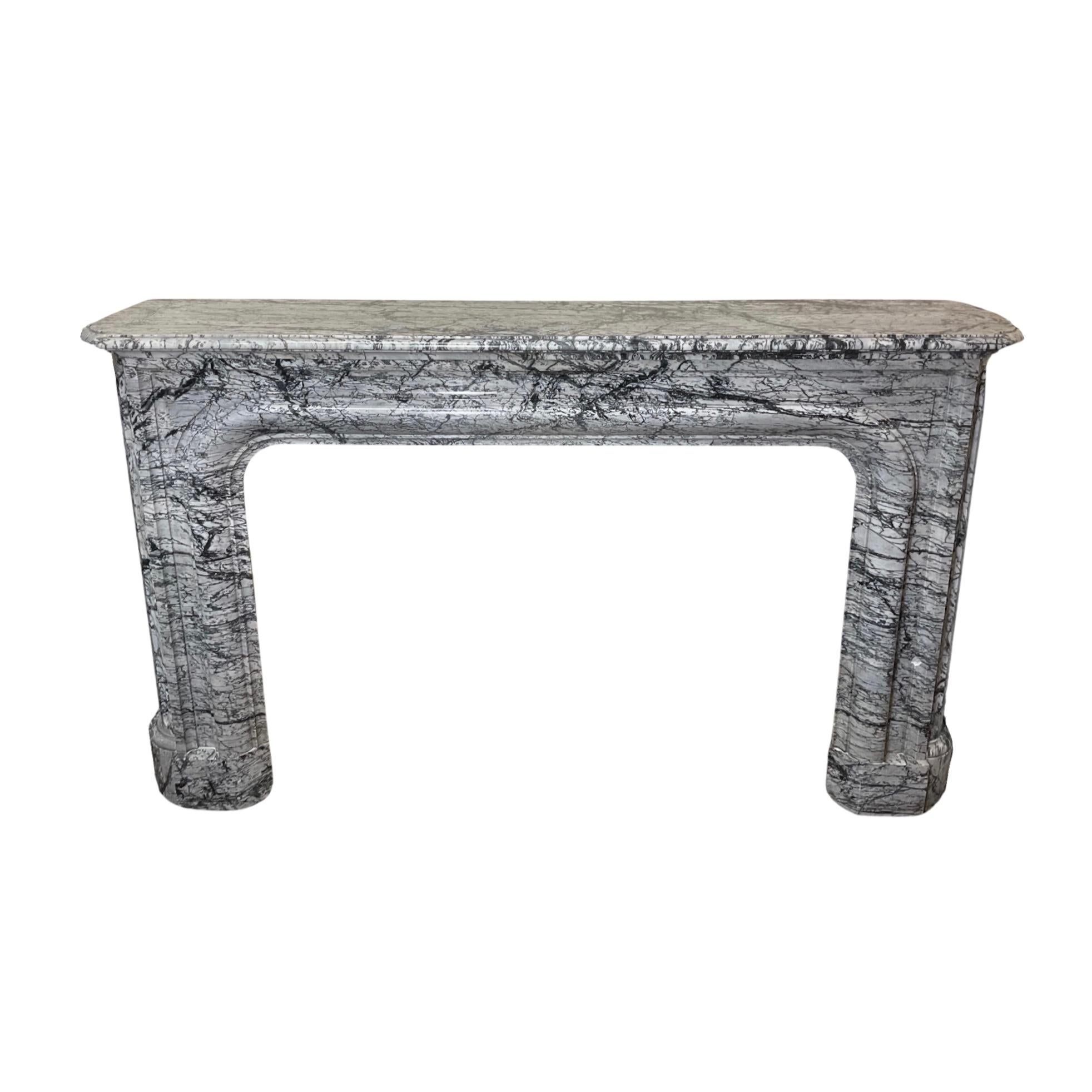 This French Bleu Fleuri Marble Mantel is a one-of-a-kind piece. Crafted from Bleu Fleuri marble from 1870, this unique mantel is a louis the 13th style, bringing a classic, traditional touch to your home.