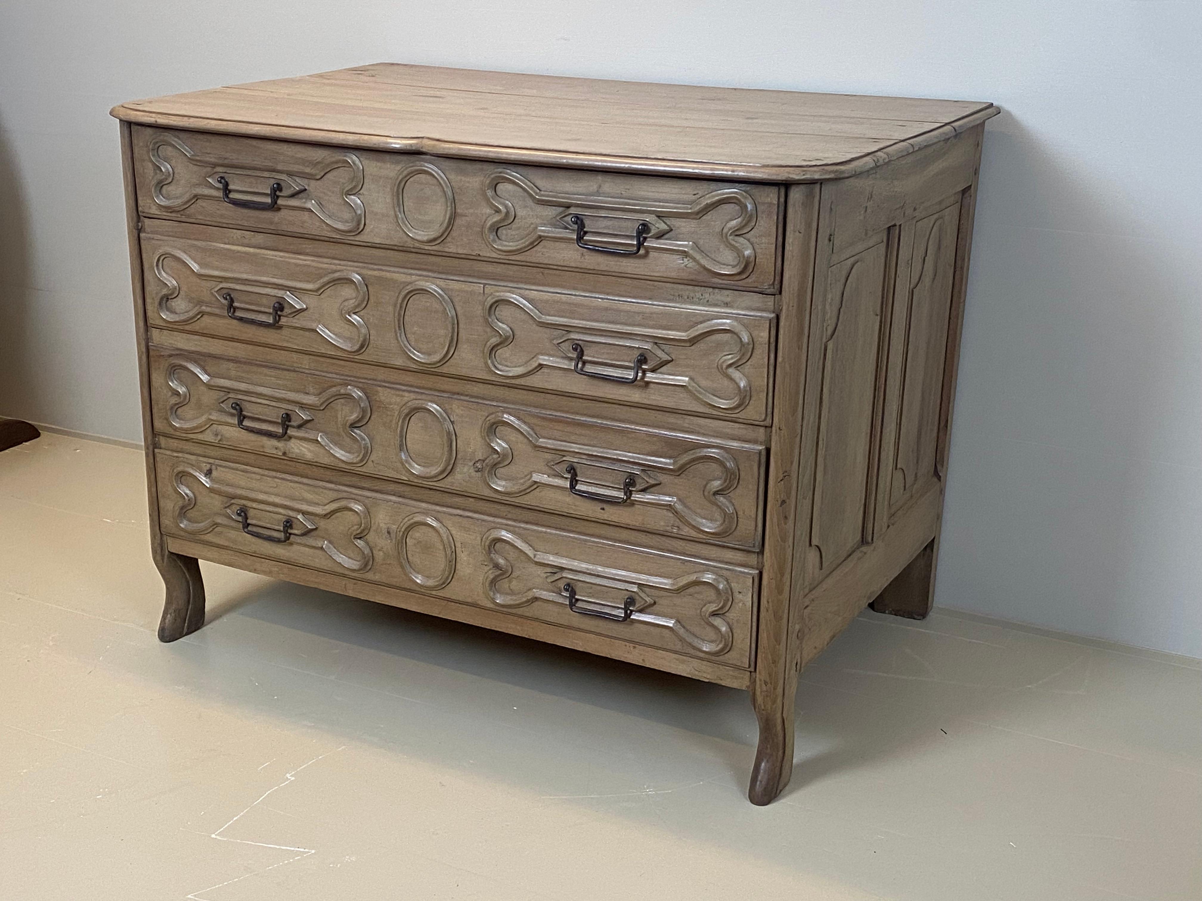 French Antique Chest of Drawers in Natural Walnut, w/Dog Bone decoration. France 1890s. For Sale