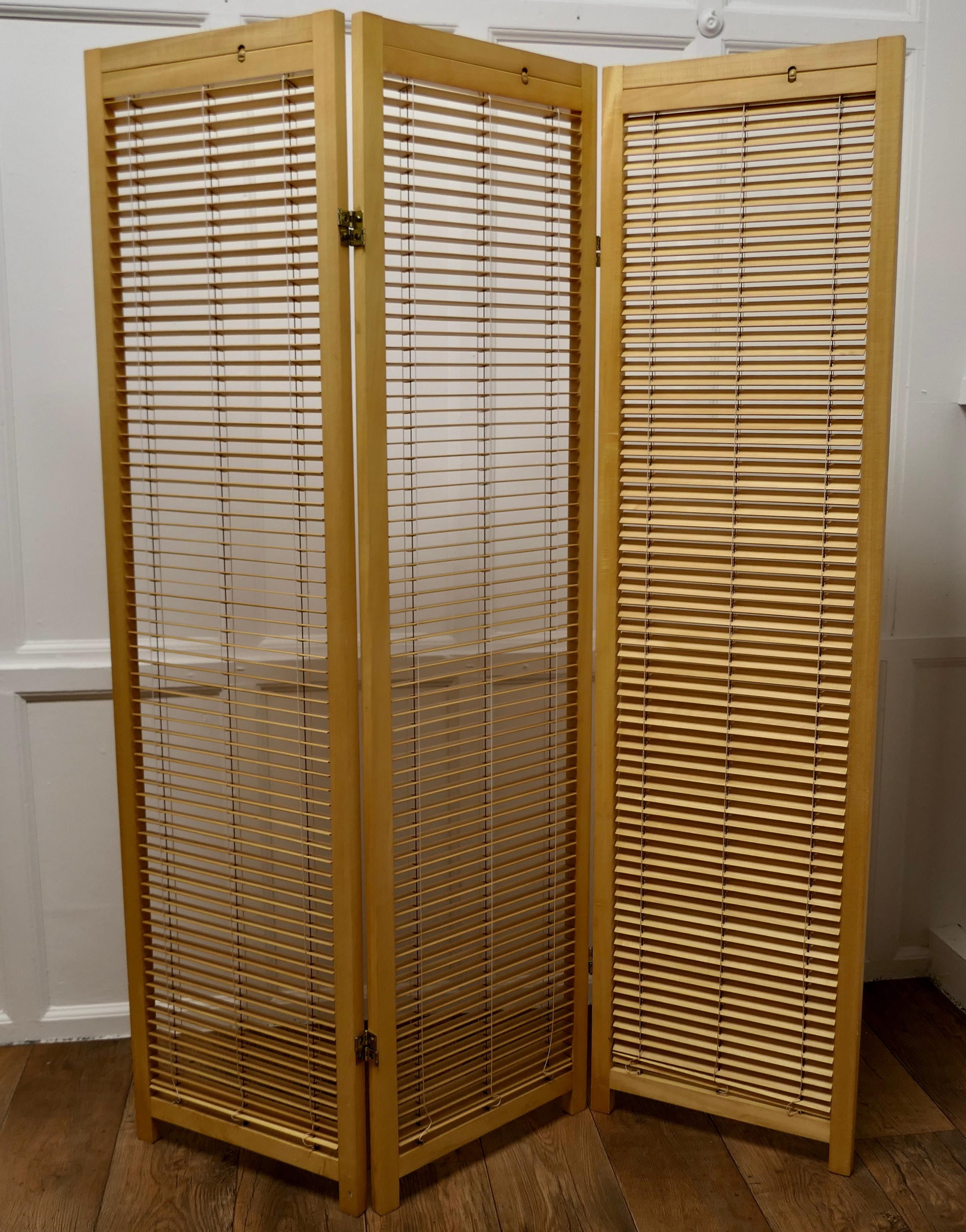 French Blonde Beech Louvered Screen Room Divider

The screen has 3 folds, each one has a mechanical full length Louveredsurrounded by a sturdy frame, this superb folding screen or room divider is an excellent piece for privacy or shade which ever