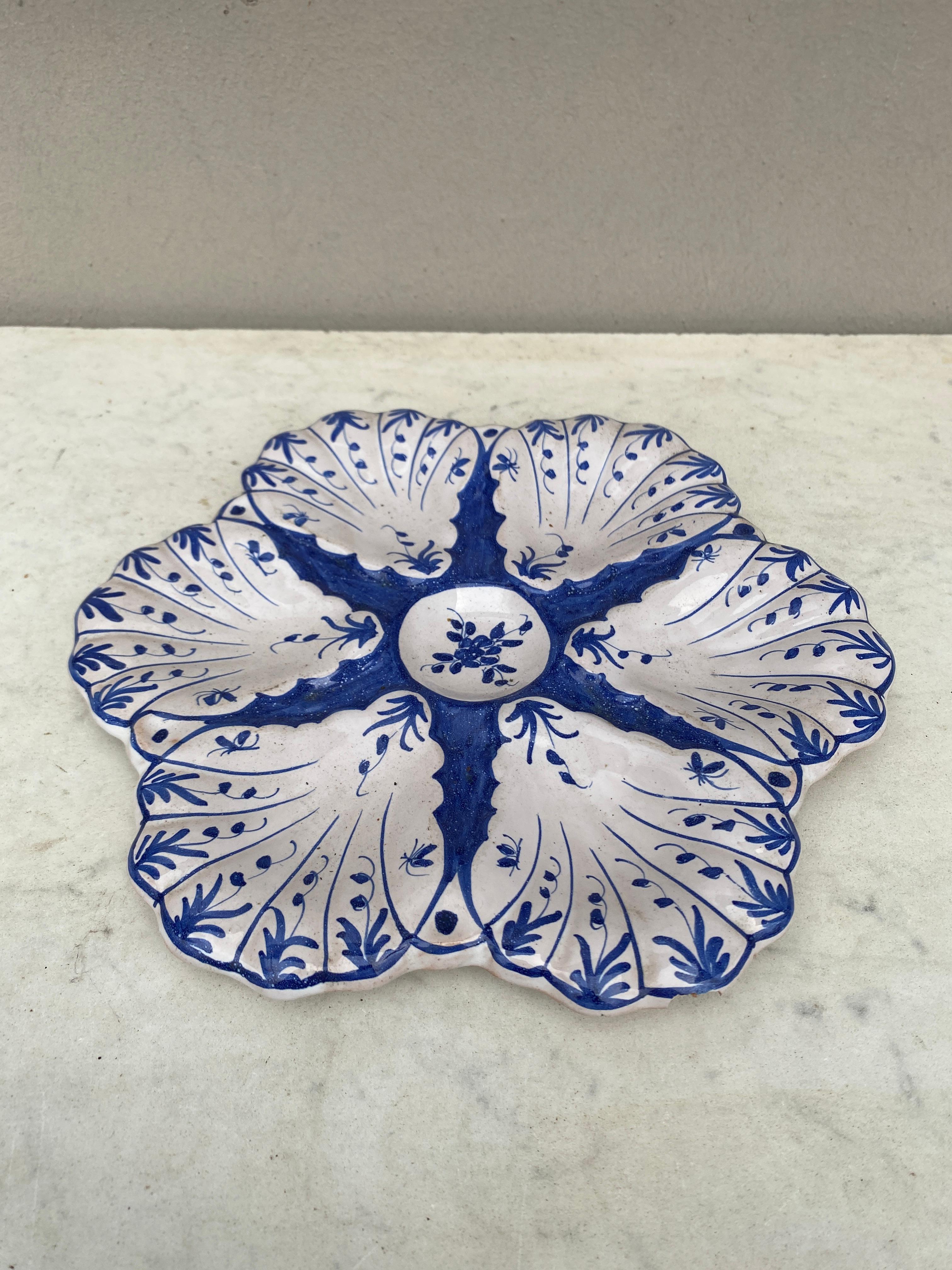 French Faience rustic oyster plate Moustiers style, circa 1940.
Chips on the back not visible on the front (pic).