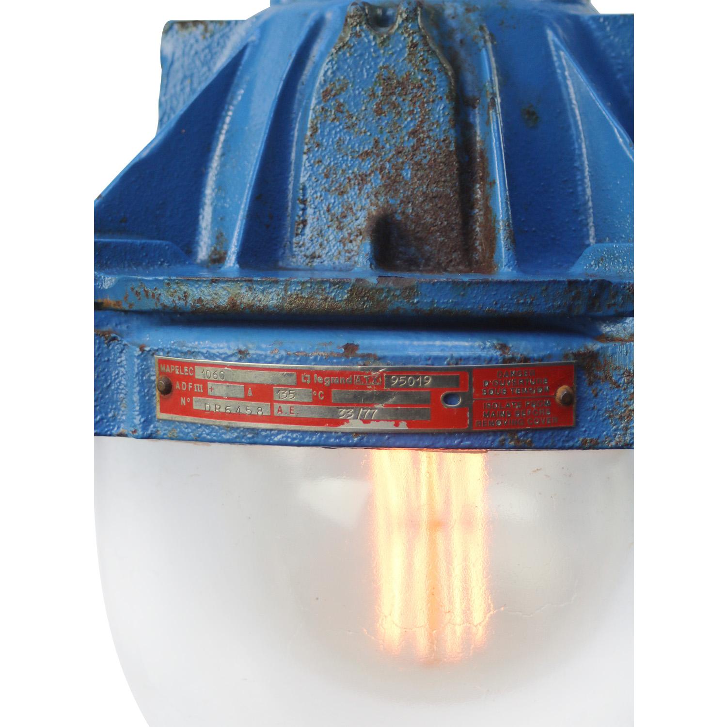 French industrial hanging lamp by Mapelec Amiens. 1977
Blue cast iron with clear glass

Heavy!

Weight: 13.80 kg / 30.4 lb

Priced per individual item. All lamps have been made suitable by international standards for incandescent light bulbs,