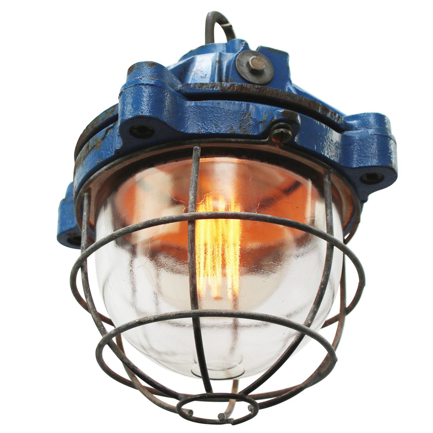 French industrial hanging lamp by Mapelec Amiens. 1977
Blue cast iron with clear glass

Heavy!

Weight: 13.80 kg / 30.4 lb

Priced per individual item. All lamps have been made suitable by international standards for incandescent light bulbs,