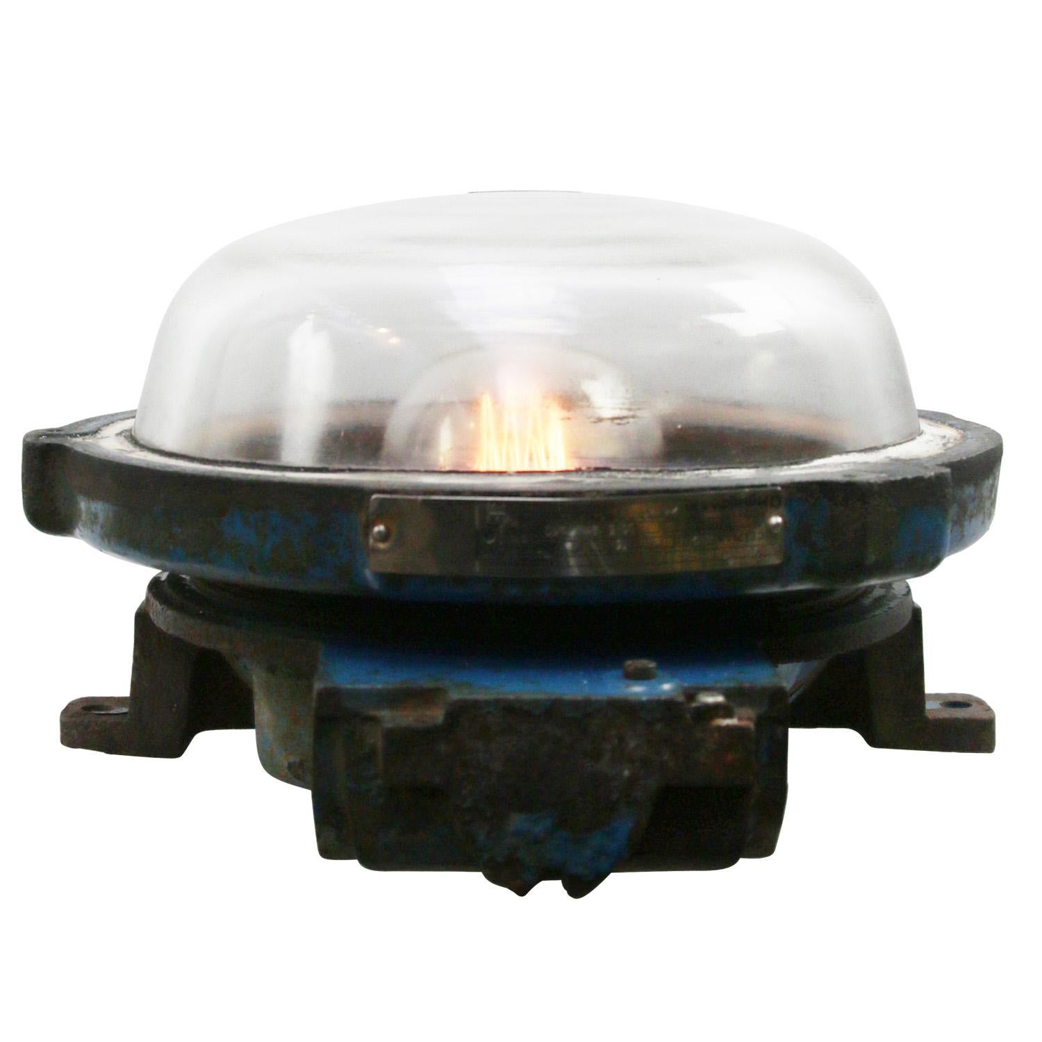 French Industrial wall / ceiling lamp by Mapelec Amiens, France
Blue cast iron with clear glass.

Weight: 14.50 kg / 32 lb

Priced per individual item. All lamps have been made suitable by international standards for incandescent light bulbs,