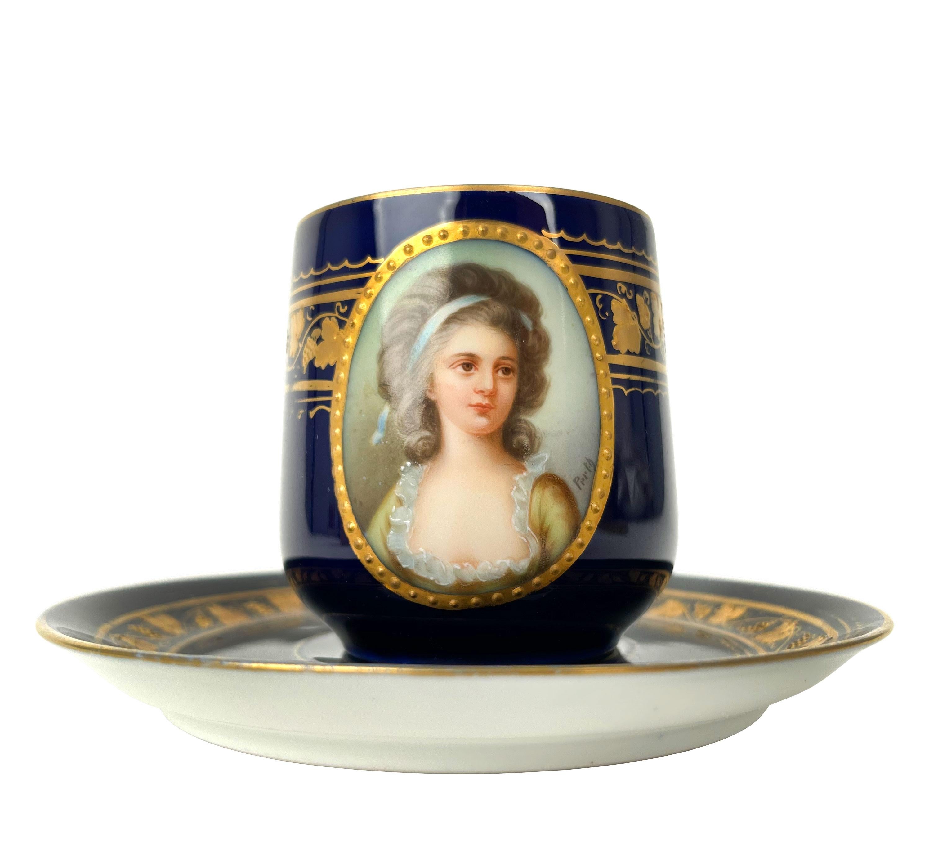 French Blue cobalt ground Hand Painted Porcelain Cup & Saucer.

Crown and the R Marking at the base
D: 5