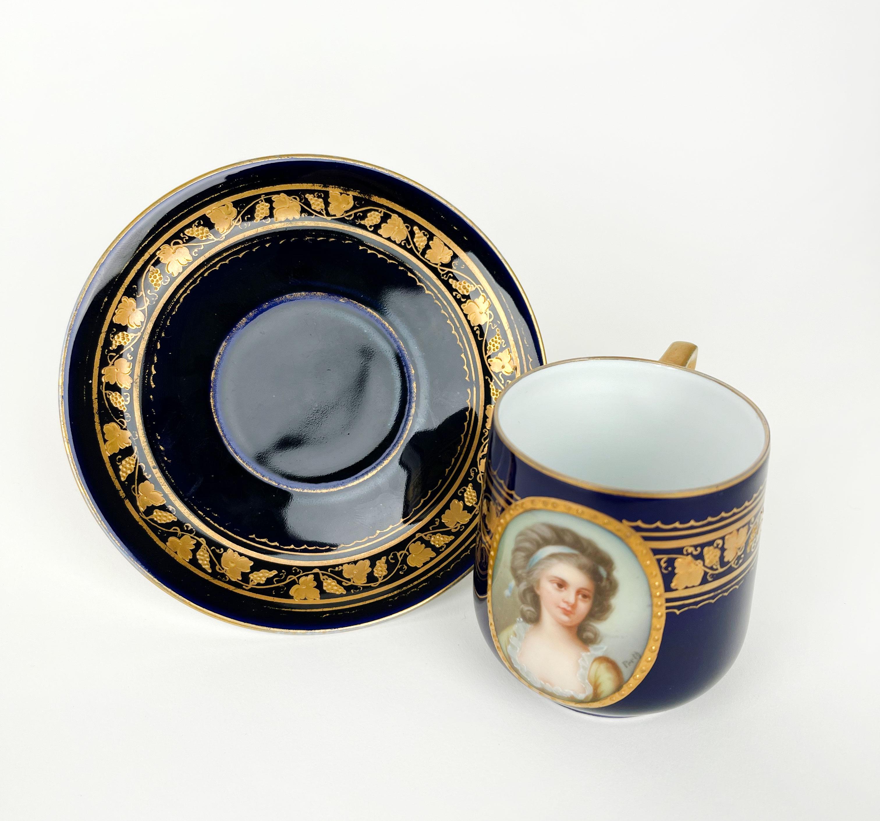 Hand-Crafted French Blue Cobalt Ground Hand Painted Porcelain Cup & Saucer For Sale
