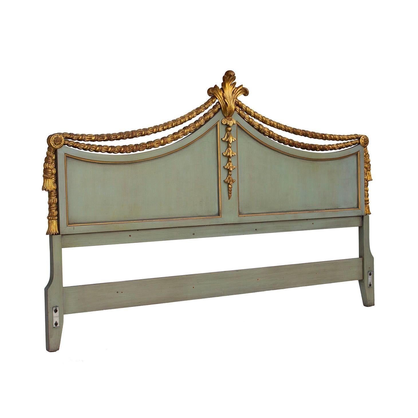 USA, 1940s
Beautiful vintage king size headboard in French blue with gold leaf detailing. Made by Karges. Detailed carved rope swag crowned by a dimensional fleur de lis.
DIMENSIONS: Headboard measures 80