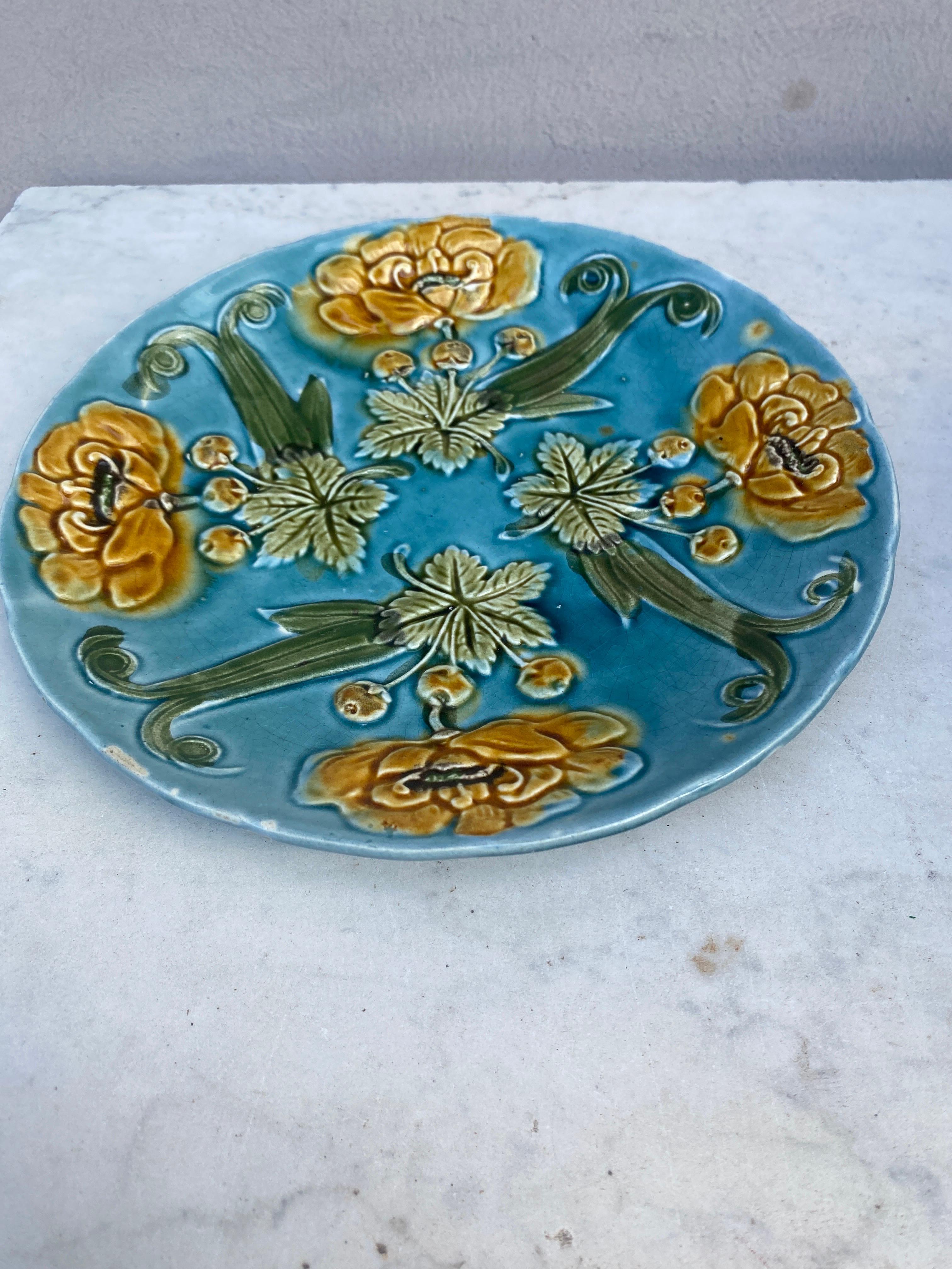 French Blue Majolica Plate with Yellow Flowers Circa 1890.