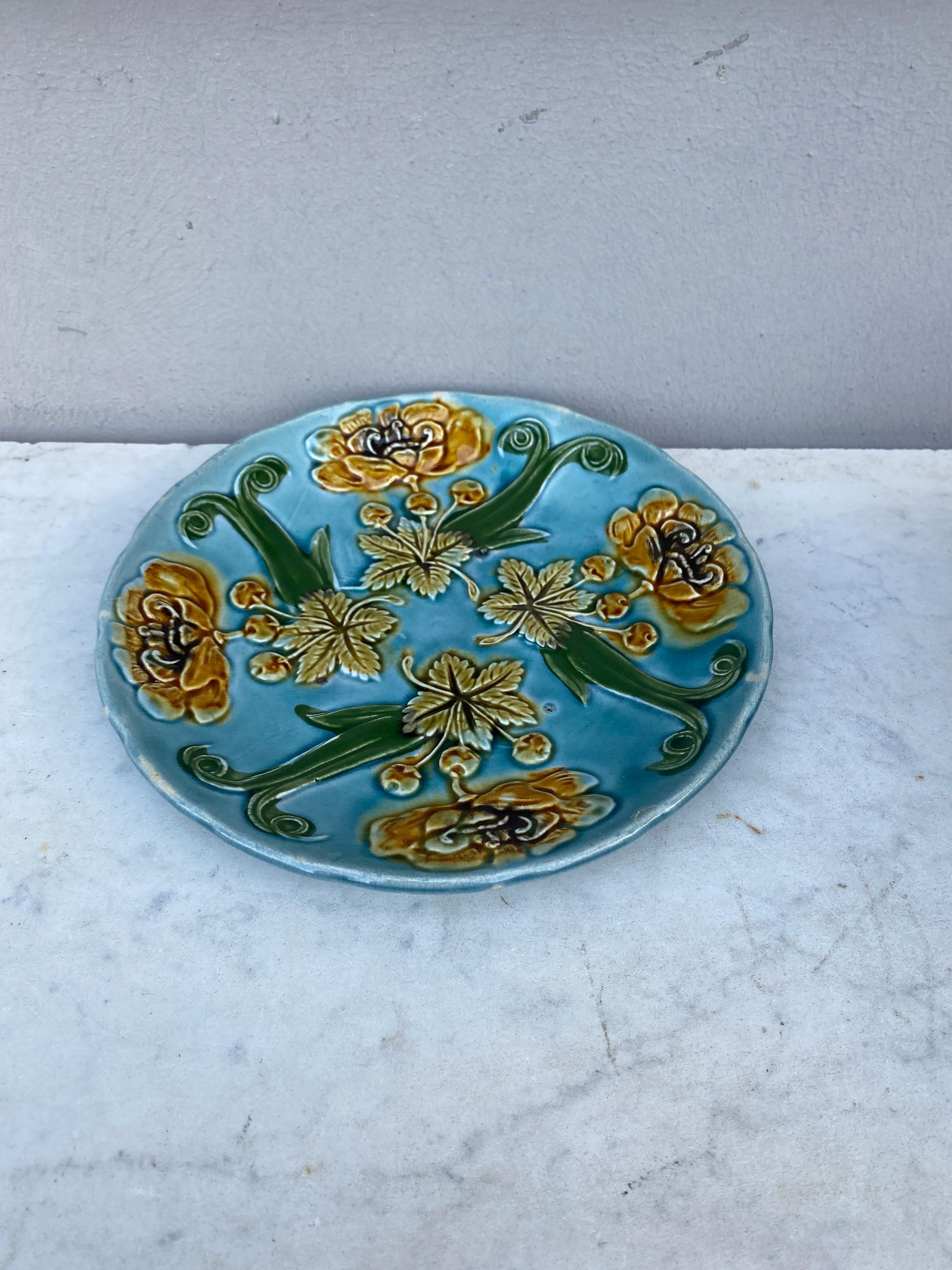 Late 19th Century French Blue Majolica Plate with Yellow Flowers Circa 1890 For Sale