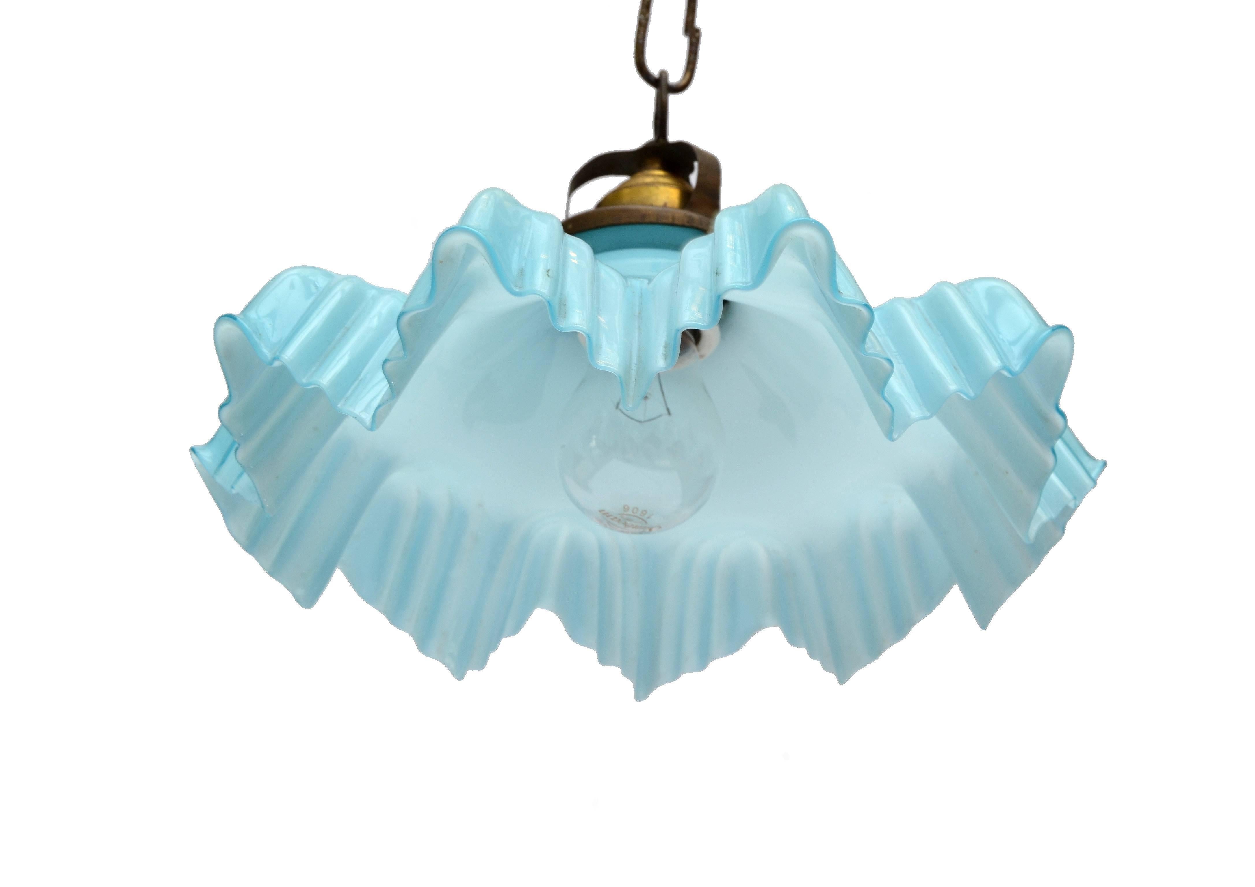 Petite vintage French blue opaline glass raffled ceiling light with bronze fitting.
In perfect working condition and uses one light bulb max. 60 watts.
 