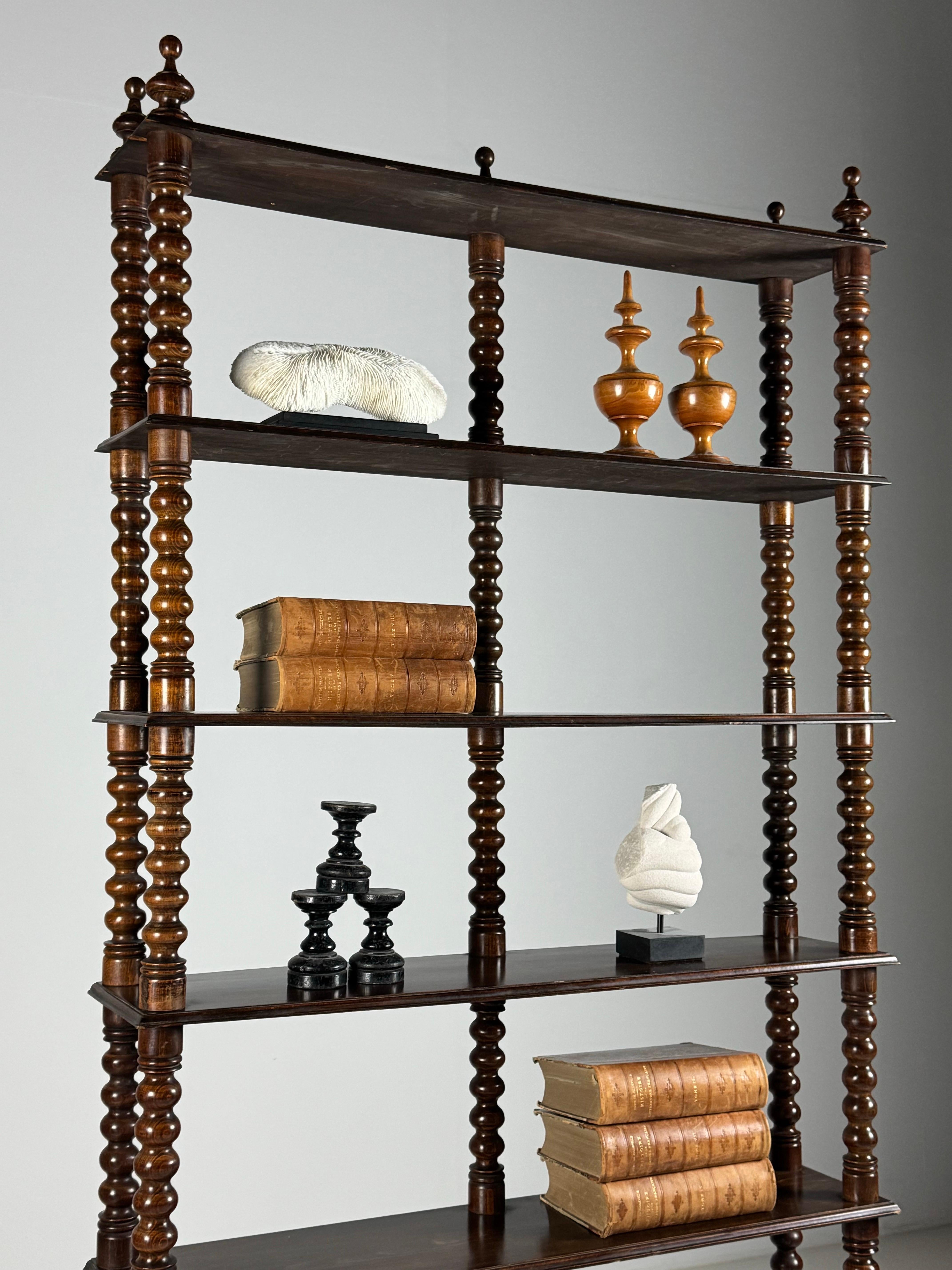 French Bobbin Bookcase / Bookshelf. Early 20th century. With 7 shelves. In very good condition.

Dimensions: 205H x 100L x 23D