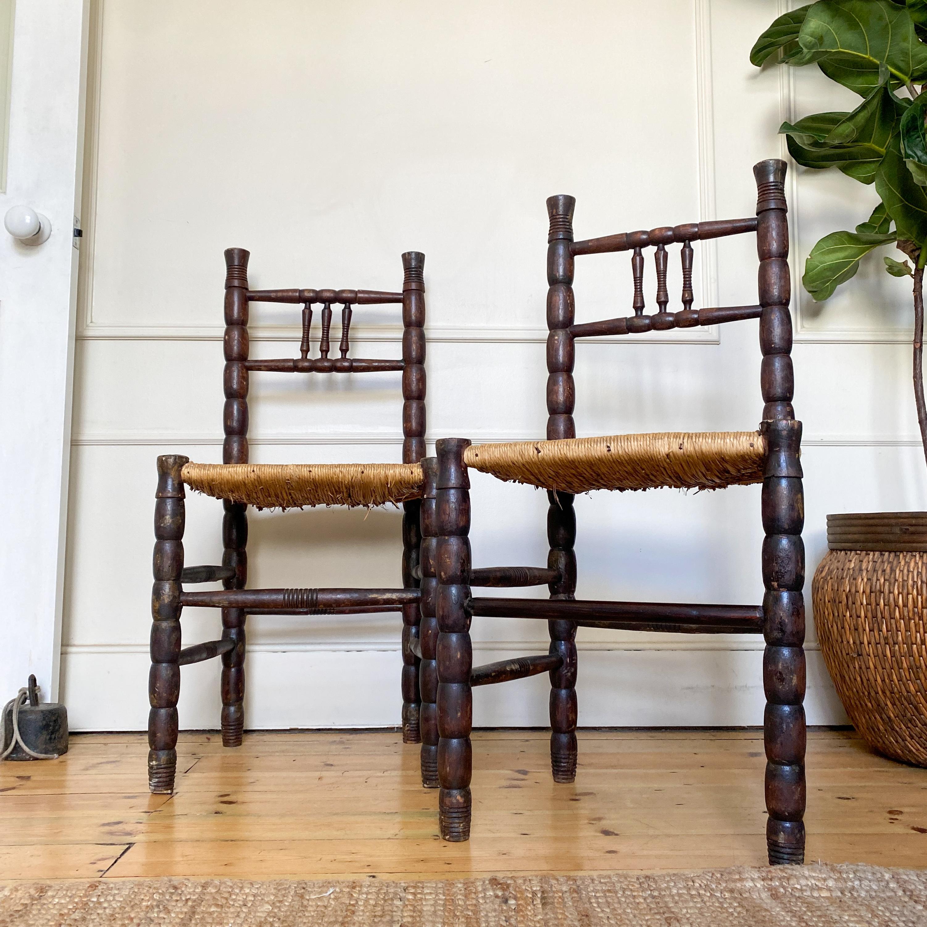 Price per chair Introduce a touch of French countryside charm to your home with these exquisite French Bobbin Rush Seat Chairs. Featuring beautifully turned bobbin legs and supports, these chairs exemplify traditional craftsmanship and rustic