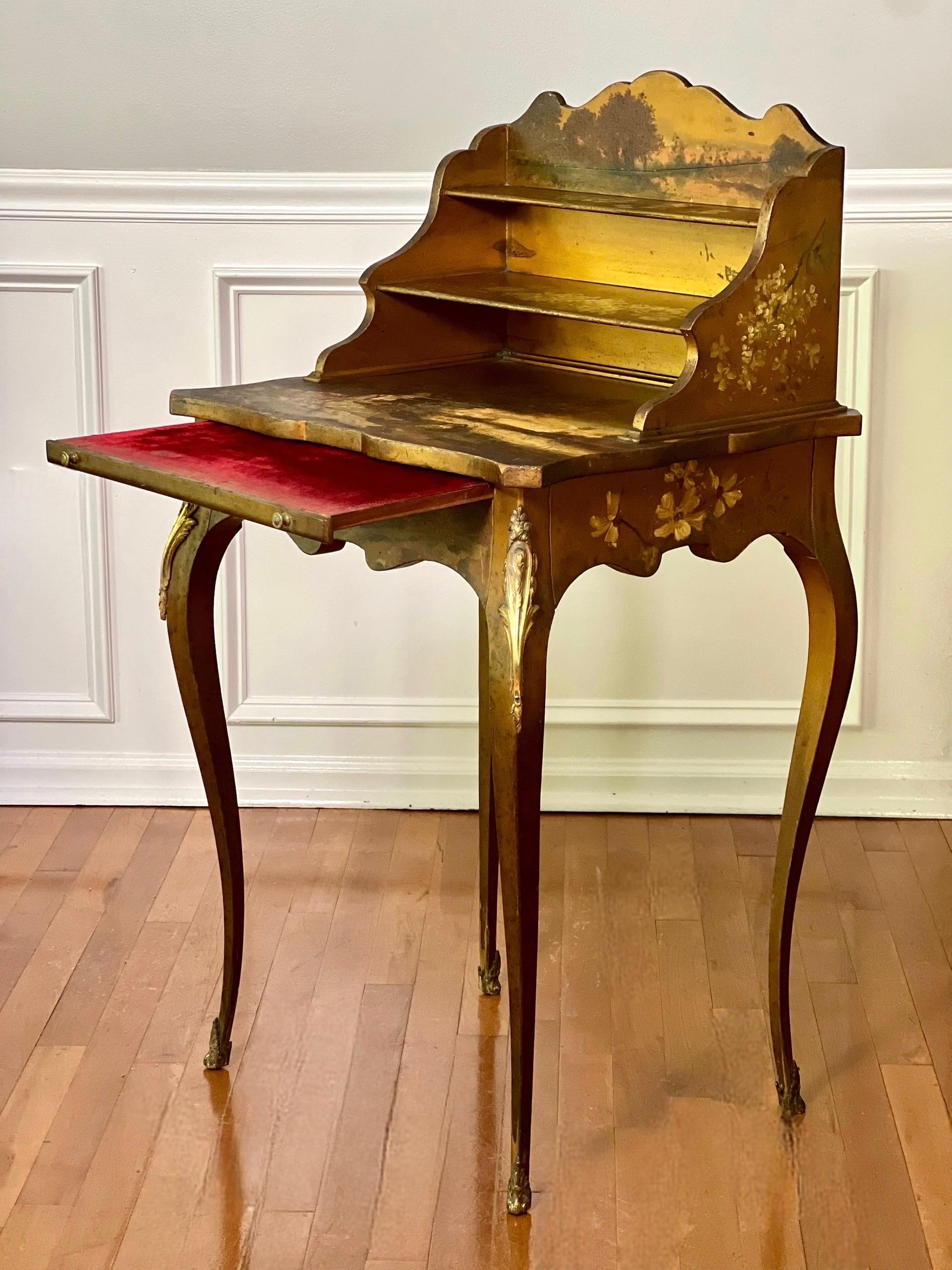 A special antique paint decorated French Louis XV style Bonheur-Du-Jour, ladies' writing desk, France, circa 1880.  A beautifully hand-painted desk adorned with flowers and tranquil scenery depicting a young lady amidst a verdant countryside