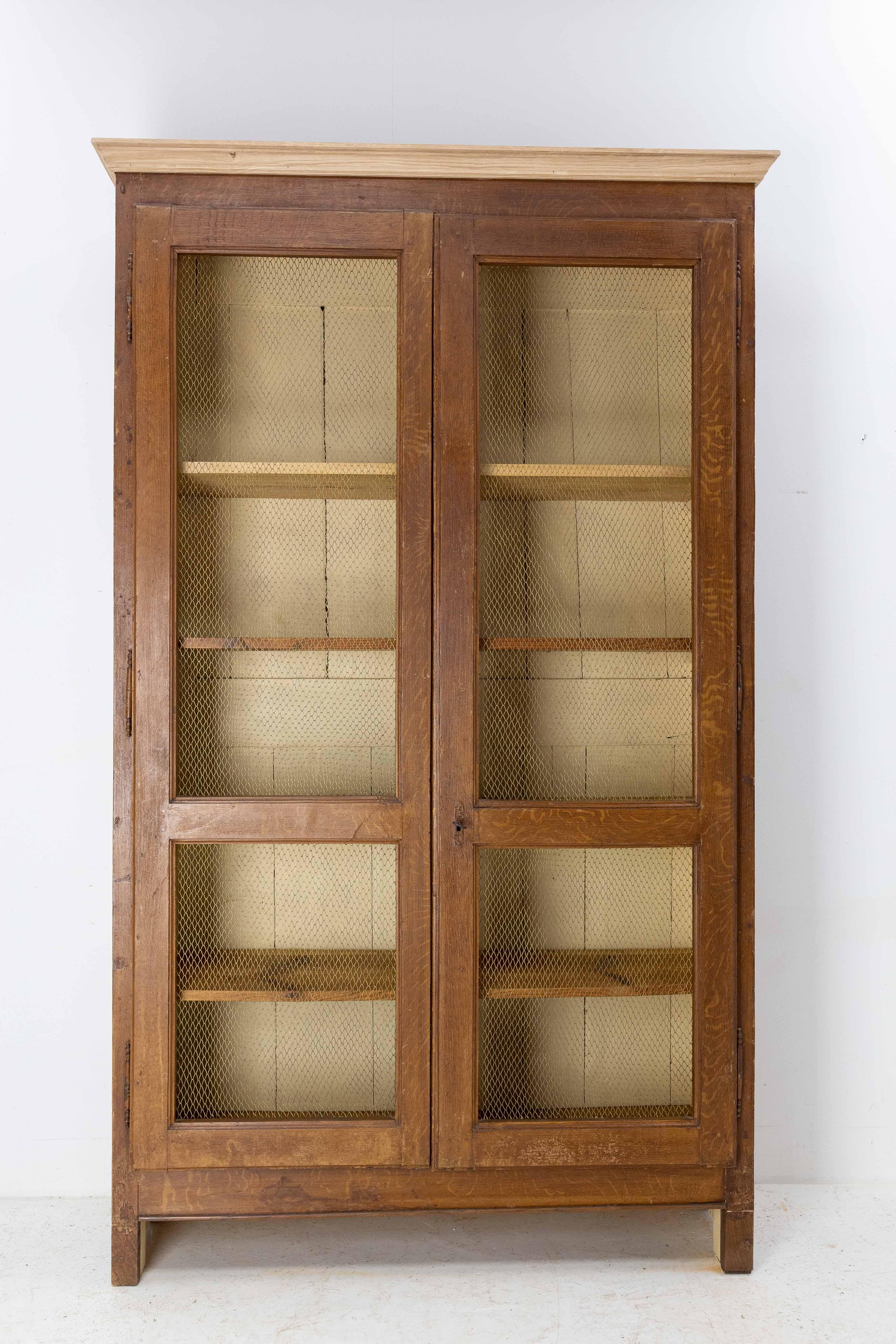 French Provincial French Bookcase with Brass Mesh Doors Late 19th Century For Sale