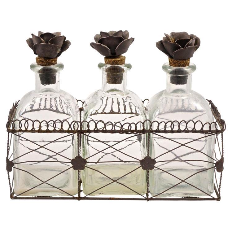 French Bottles with Flower Cork Stoppers in a Wire Basket Holder, circa 1950s