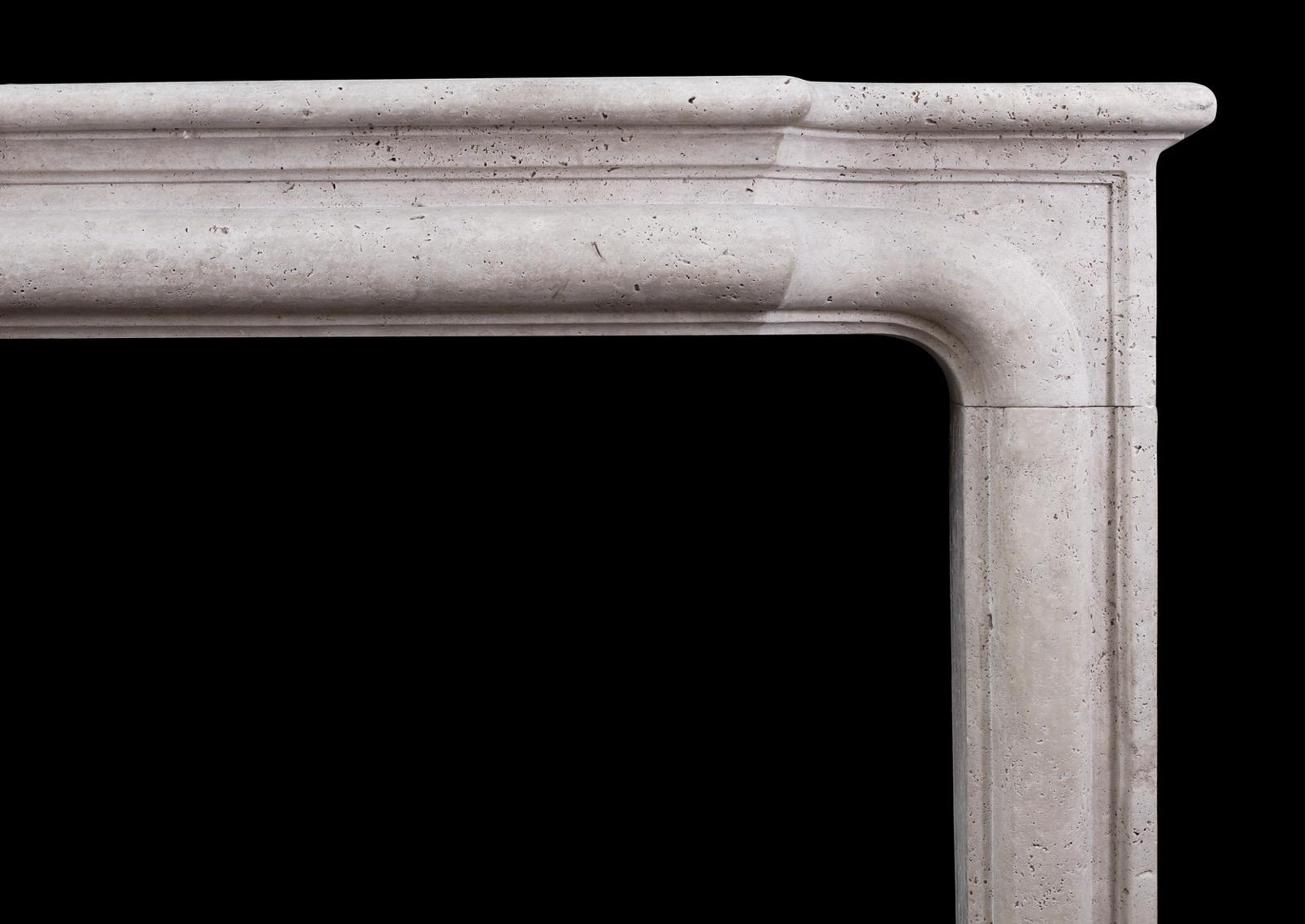 A substantial French Boudin fireplace in light travertine stone, with moulded jambs and shaped moulded frieze. An imposing yet graceful piece. A copy of an original.
N.B. May be subject to an extended lead time.

Measures: Shelf width 1535 mm 60 3/8