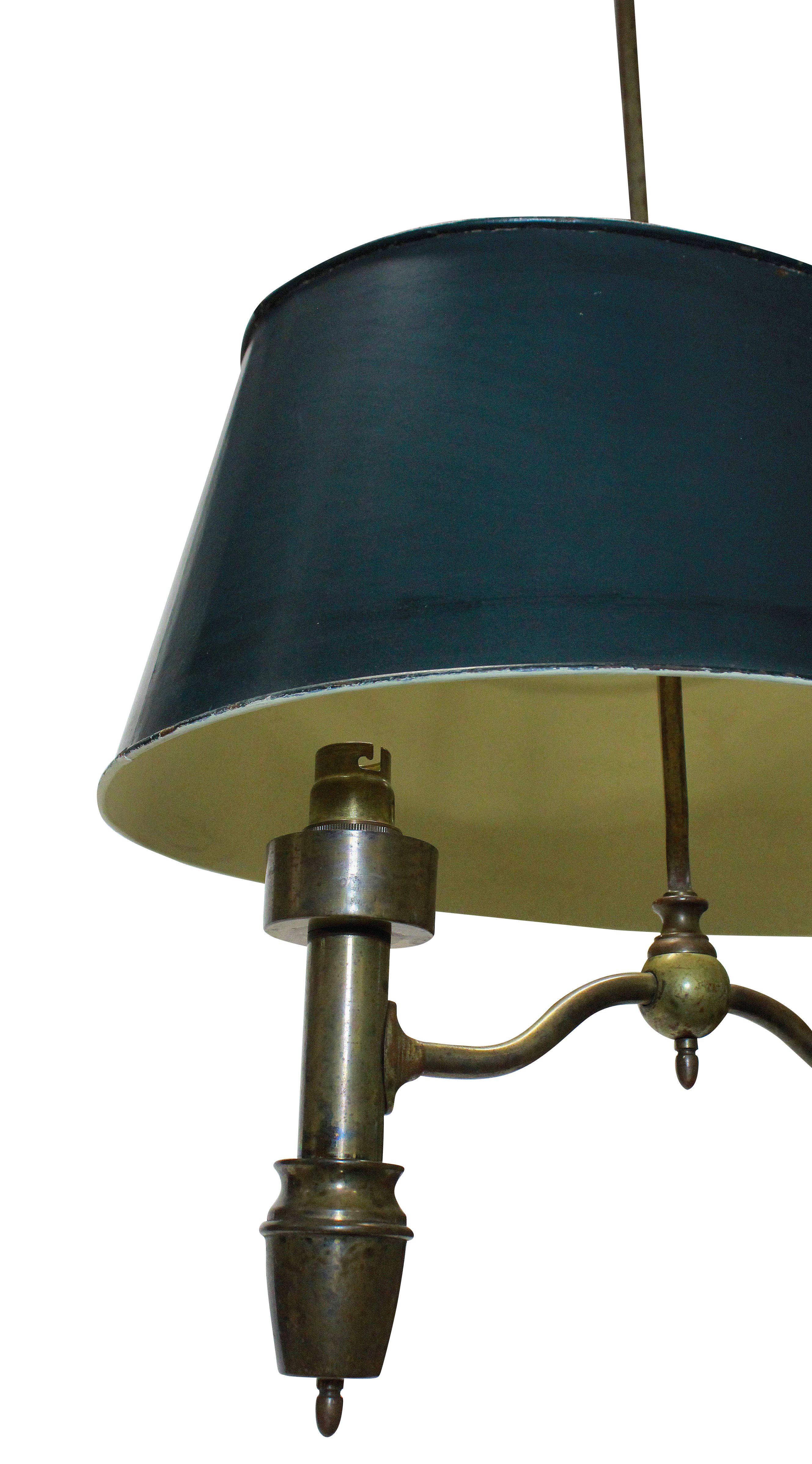 A French brass, twin light hanging Bouillotte light with adjustable painted shade. Formerly for oil, now electrified.