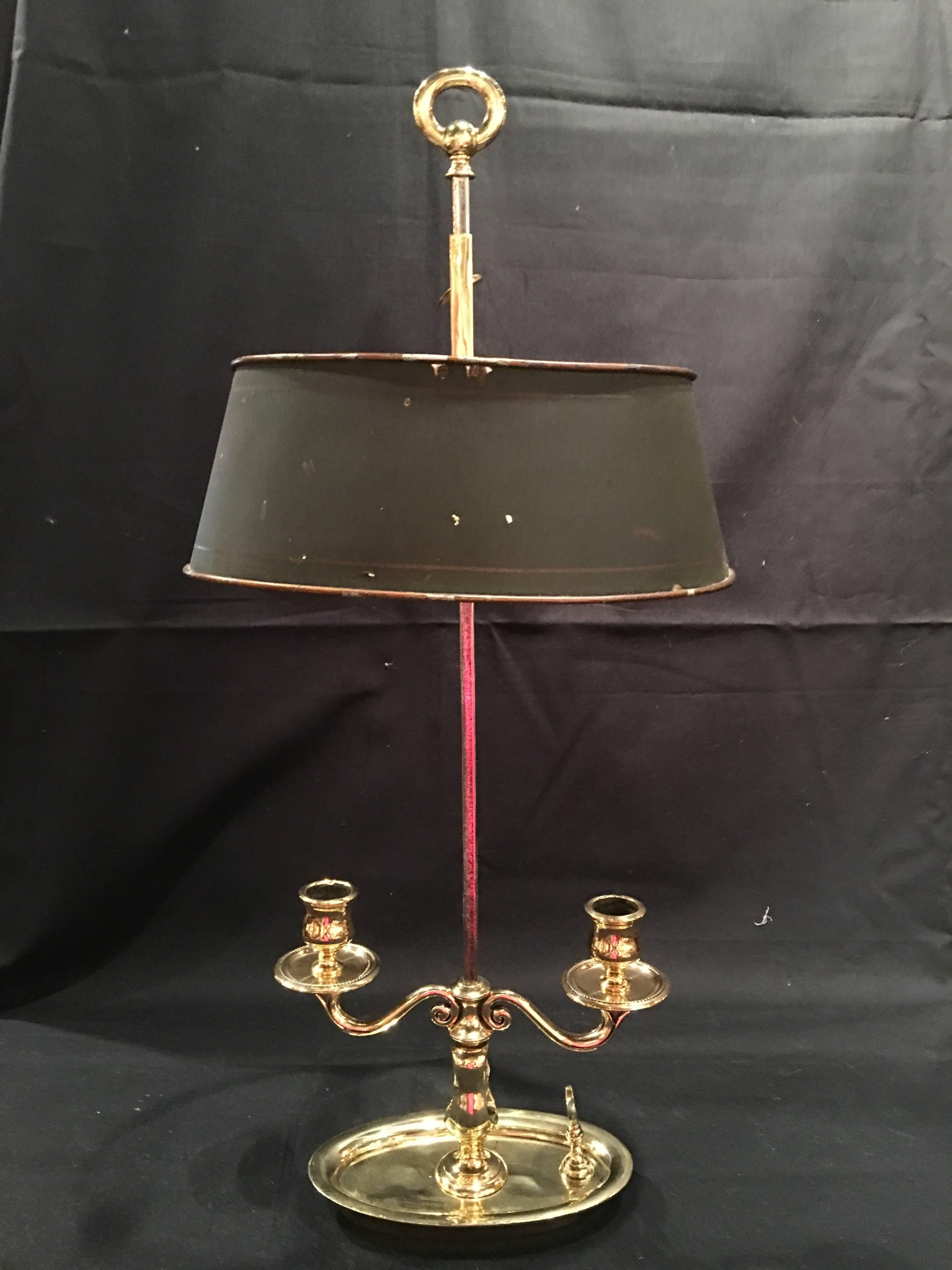 French Bouillotte two-candle lamp polished brass with metal shade, 19th century. It can be electrified at no additional cost.