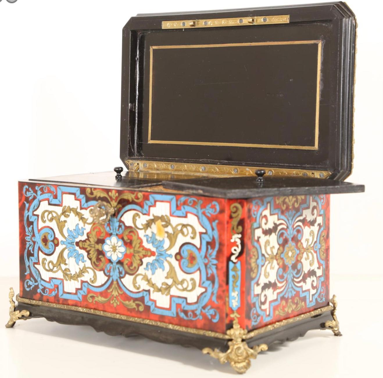 Rare 19th Century French Boulle, Brass and Tortoiseshell Tea Caddy. Elaborate boulle work, French tea caddy in rare three color enamel, bronze dore borders and mounts, boulle work on all sides. The wood carcass inlaid with intricately patterned