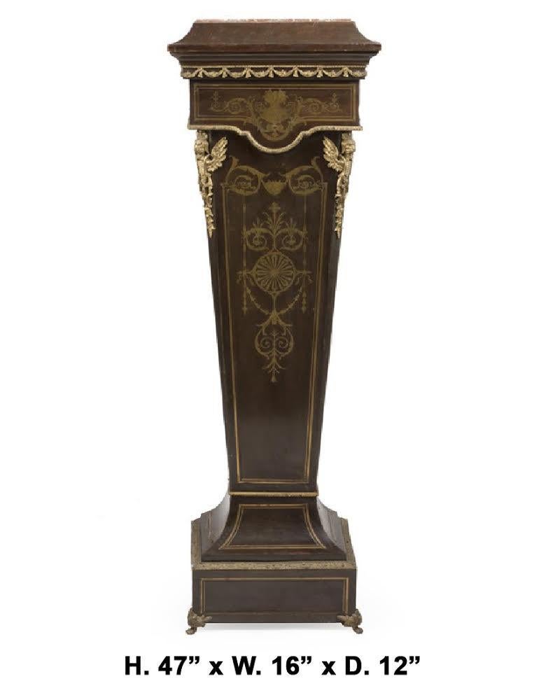 Lovely French Napoleon III Boulle ebonized pedestal, 19th century. 

The pedestal is inset with a rectangular marble top, above a Boulle style brass inlaid column decorated with a central urn within a scrolling foliate motif, the corners are
