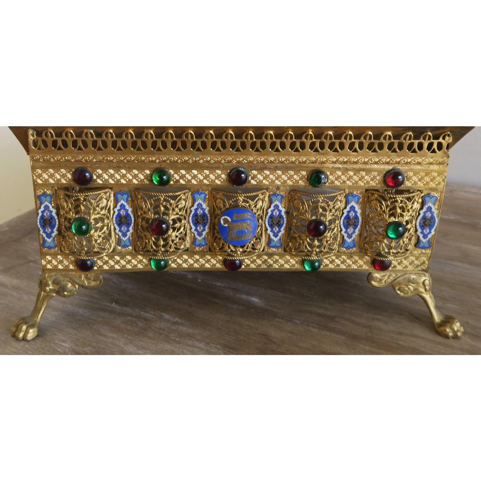 This elegant, antique Bible holder was crafted in France, circa 1870. The ornate, adjustable book stand has a large engraved cross on the front with six oval cloisonné medallions under the gallery surrounded by beautiful round stones, intricate