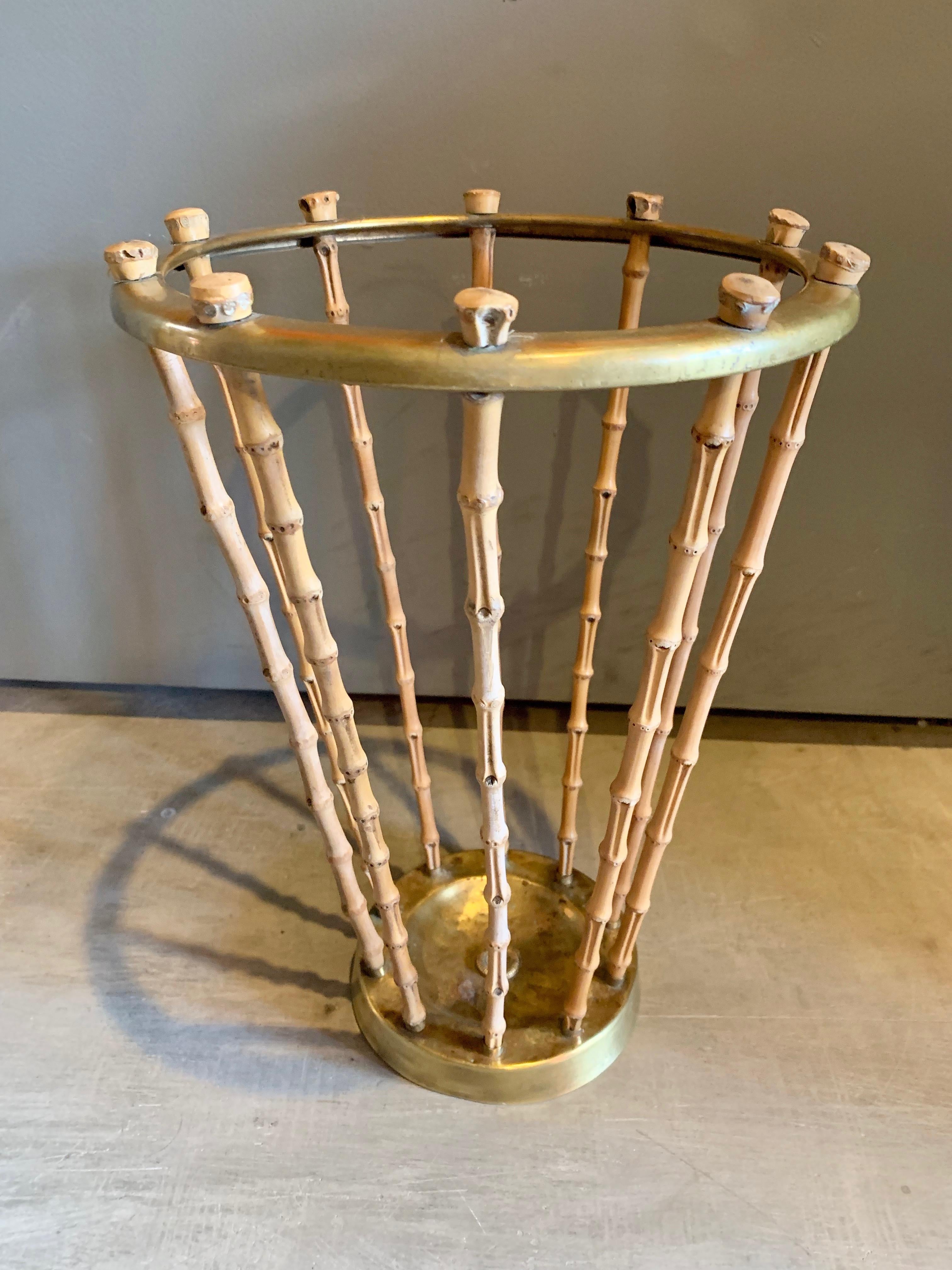 Excellent French brass and bamboo umbrella stand. Cool sculptural object. Great vintage condition.