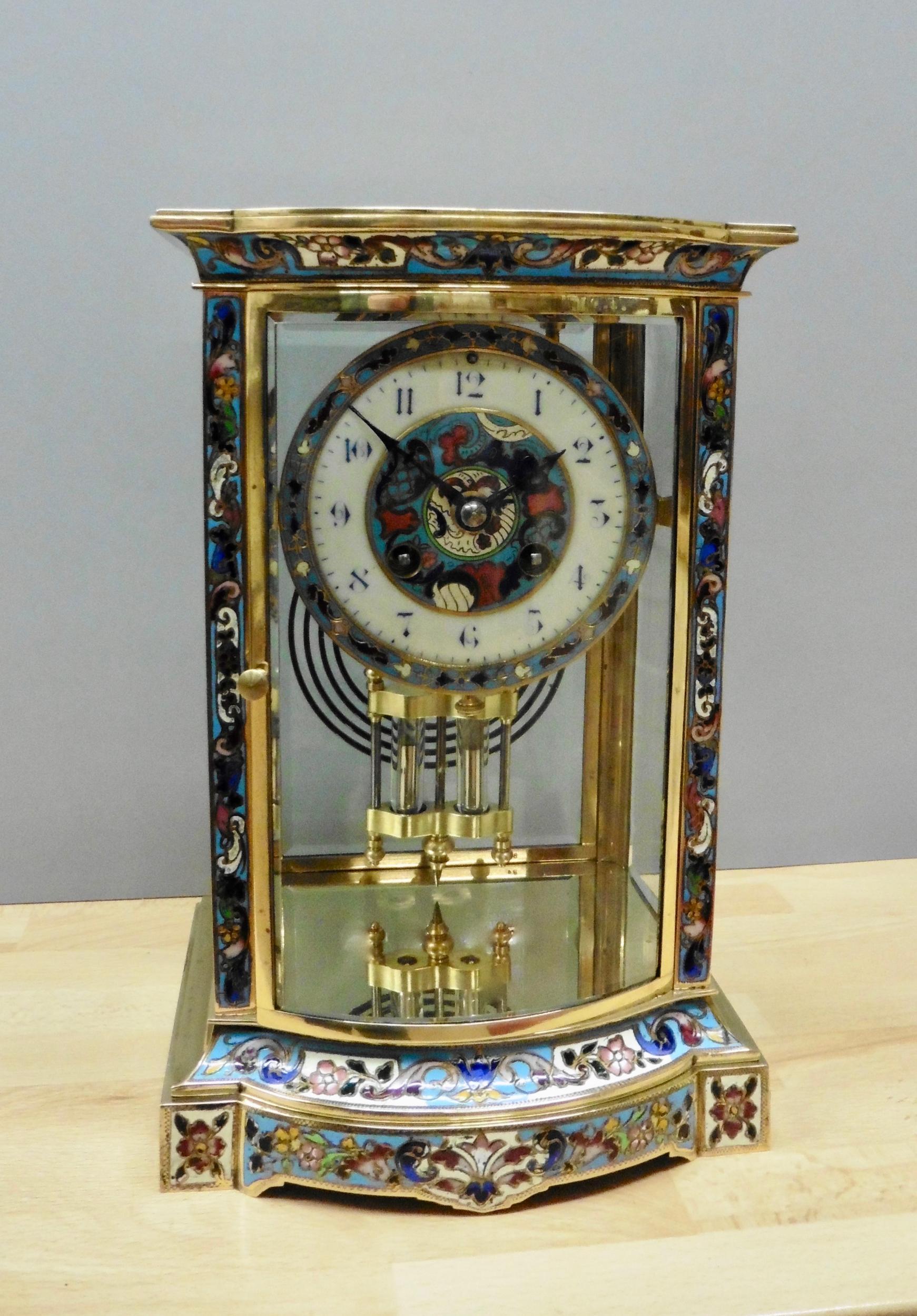 French brass Champleve enamel mantel clock. 

Finely decorated brass and champleve bow fronted case with sky blue ground and floral enamel .

Enamel dial with champleve decorated bezel and dial centre. Blue Arabic numerals and original ‘blued’