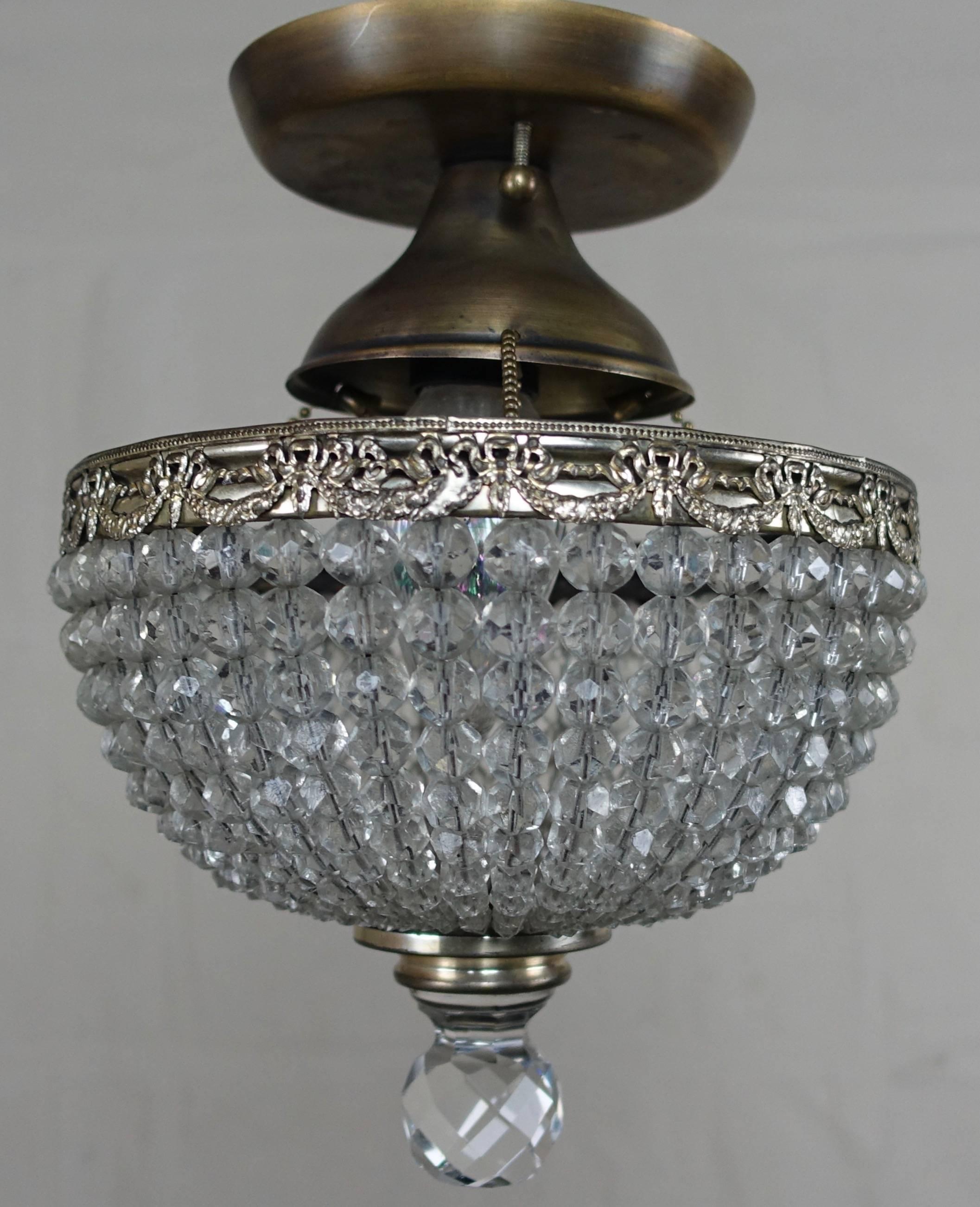 French brass and crystal beaded platfonnier. It is a perfect size for a small bathroom or closet.