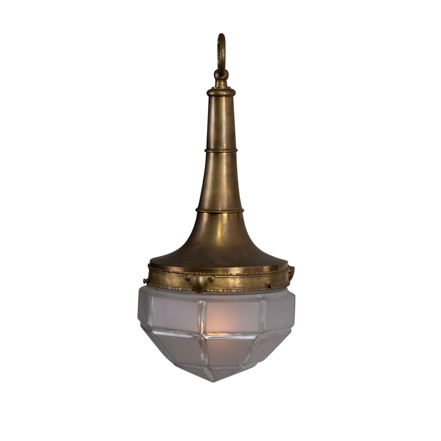 French brass and frosted glass hall lantern pendant circa 1930: Beautiful brass pendant with hand blown frosted glass shade. Art Deco in style and excellent in quality. Simple and elegant with a gorgeous brass patina. Includes 18 inches of chain