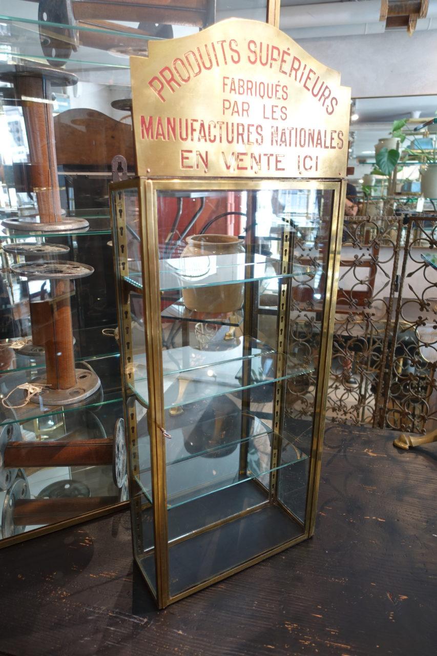 Stunning vintage French brass vitrine. Original key, and three glass shelves with adjustable brass attachments. Provenance – boutique inventory. In great condition.