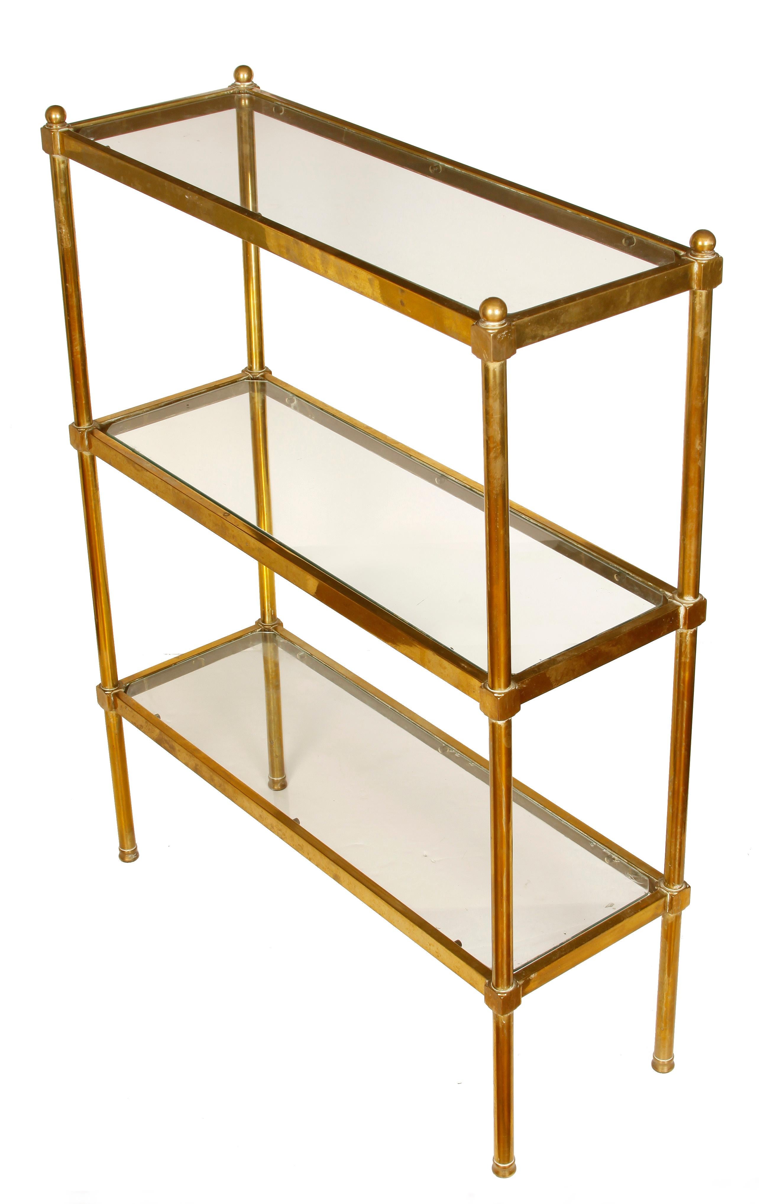 Three tier French brass and glass étagère, circa 1970.
