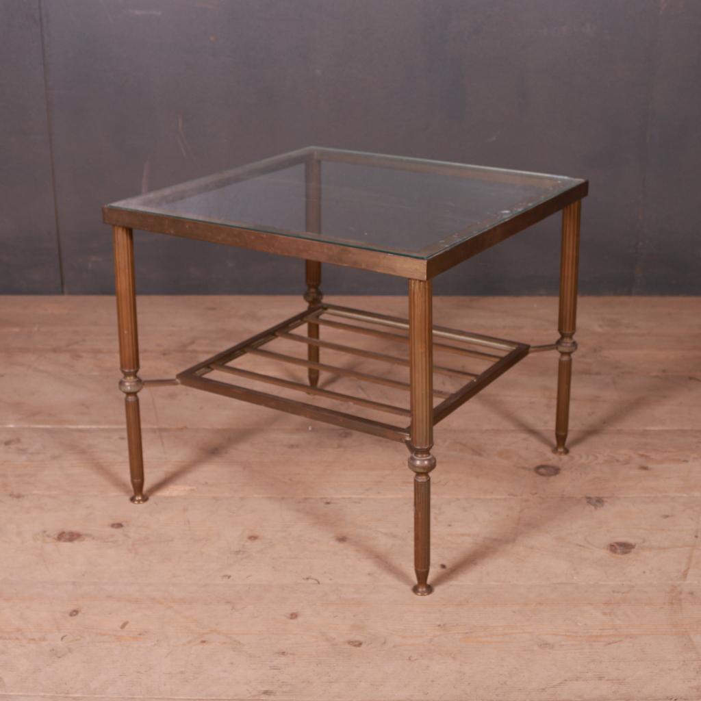 1950s French brass and glass side table, 1950.

Dimensions
18.5 inches (47 cms) wide
18.5 inches (47 cms) deep
16.5 inches (42 cms) high.